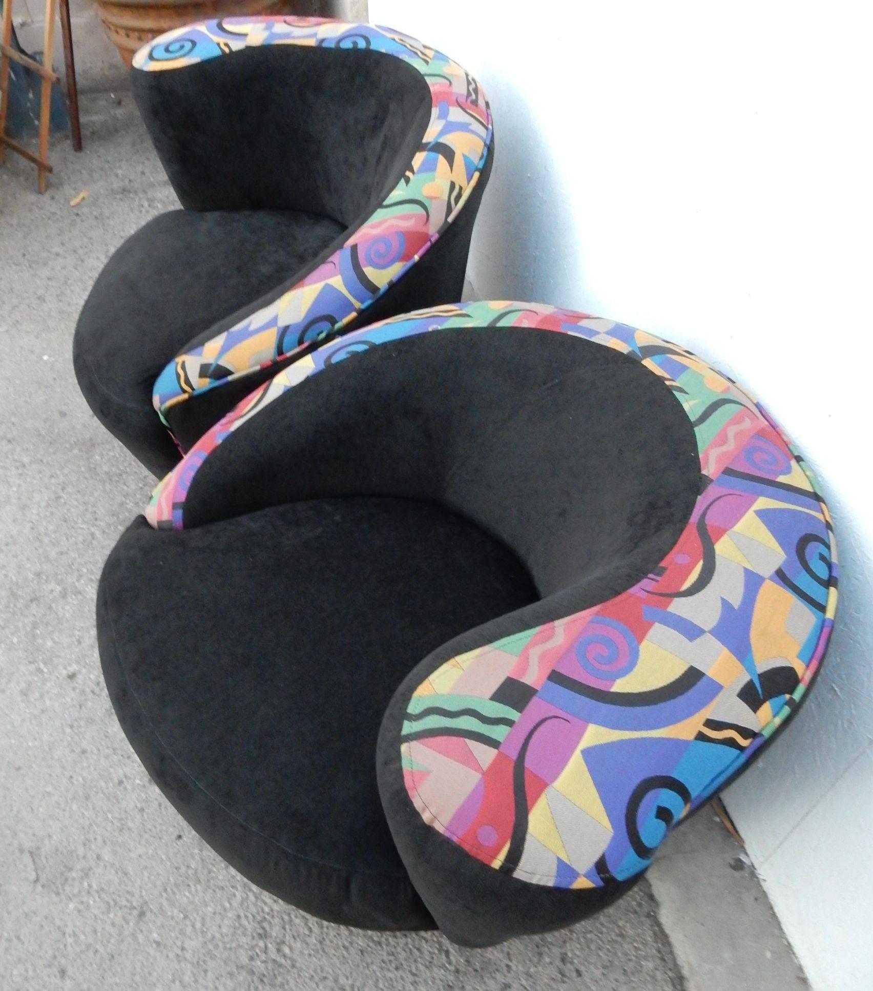 A very nice and clean pair of swivel club chairs designed by Vladimir Kagan for Directional titled the 
