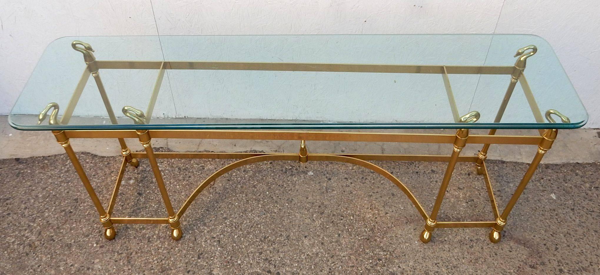 Fabulous vintage brass console table by LaBarge furniture with brass swan motif.
Beautiful golden brass flat bar construction with large beveled glass top.
Exceptional condition