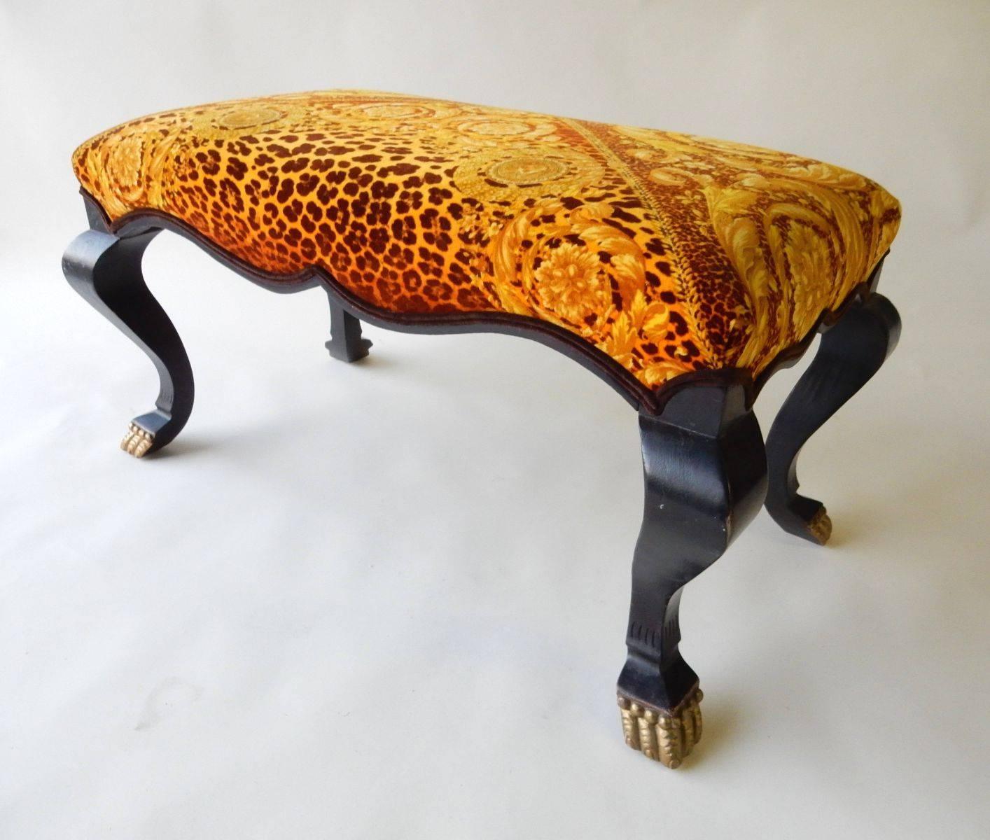 This fabulous vintage bench with claw feet is upholstered in authentic (signed) vintage Gianni Versace' velvet leopard print fabric.
An exceptional one of a kind piece.
