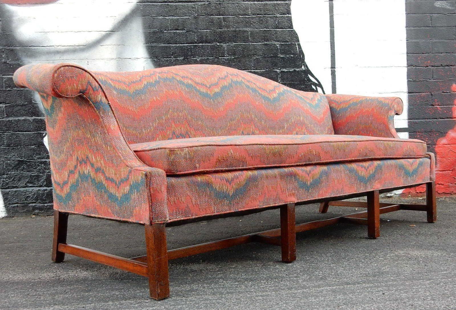 To-die-for antique Chippendale camelback sofa adroitly pattern match upholstered in a gorgeous Missoni inspired zig-zag fabric.
A functional piece of art furniture in immaculate condition. Solid with new premium foam seat cushion.