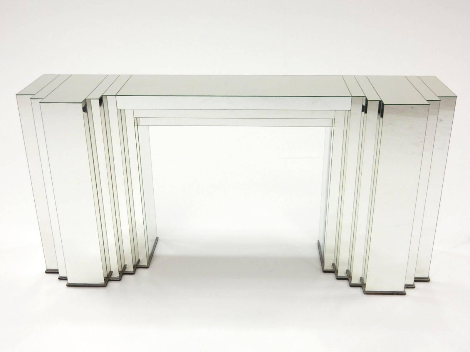Multifaceted mirror console table in the manner of Paul Frankl. Not signed or marked. 
Large and exceptionally well crafted piece of functional art furniture.
