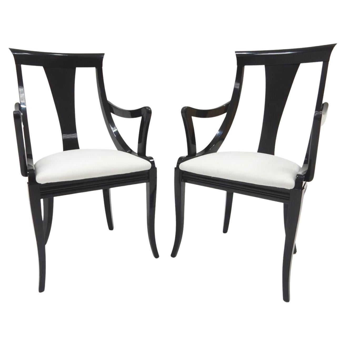 Sculptural armchairs by designer Pietro Costantini in glossy black lacquer.
Distributed by Ello Furniture, circa 1970s.
Chairs are new upholstered in woven white wool.
Each has Pietro Costantini tag on back of cushion.
All are solid with no