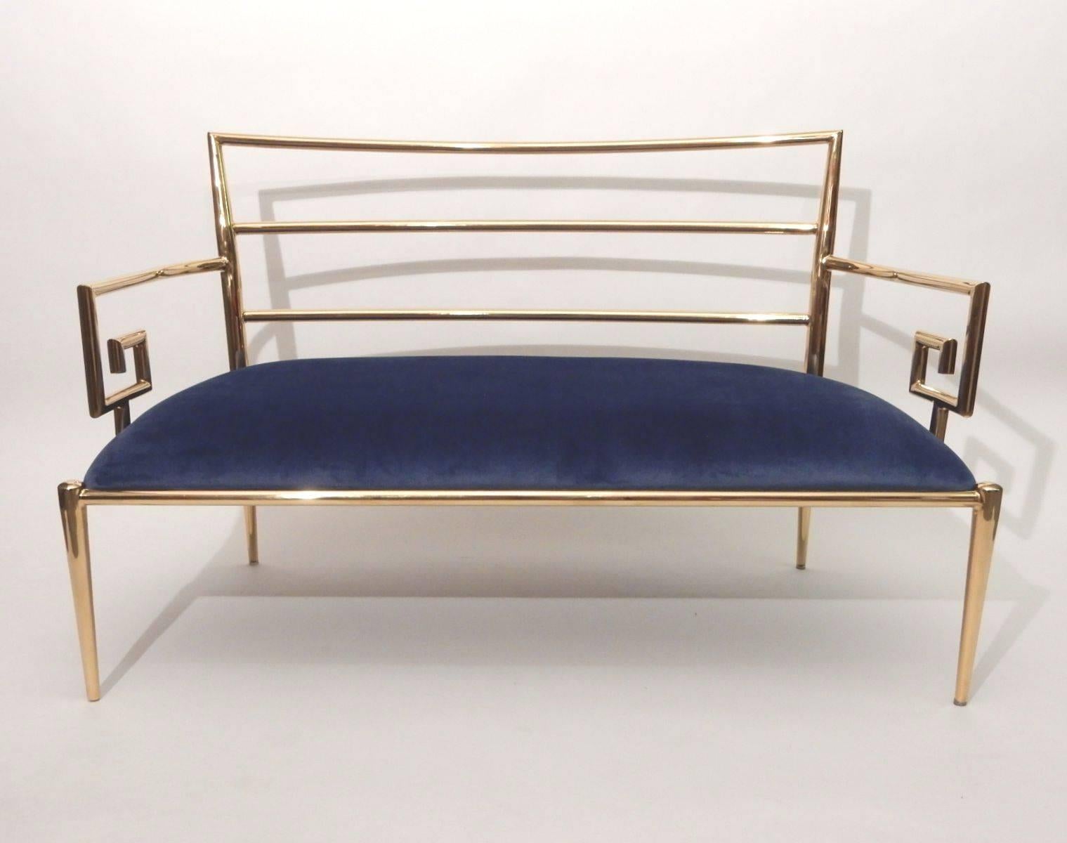 This is an amazing solid brass settee with Greek key arm design, tapered legs and seamless welds.
Upholstered in Royal blue velvet.
Exceptional craftsmanship, possibly by Mastercraft Furniture.