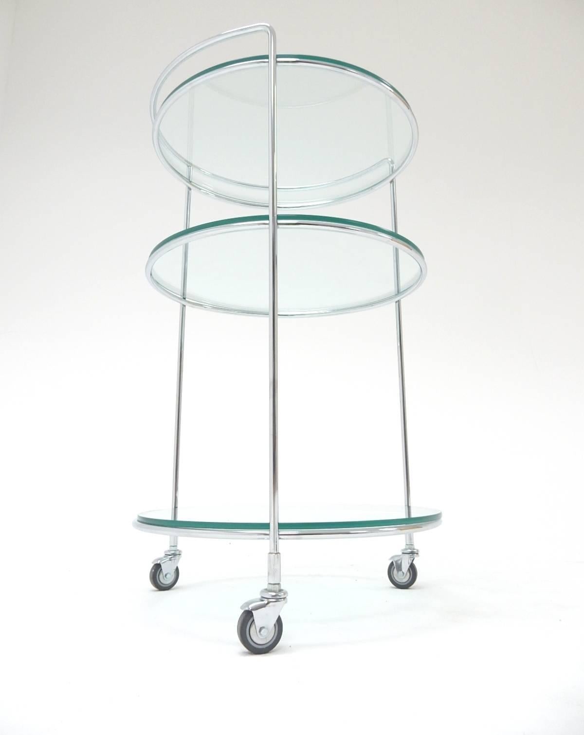 Minimalist in design, this circa 1970s bar cart is sculpted of 1/2
