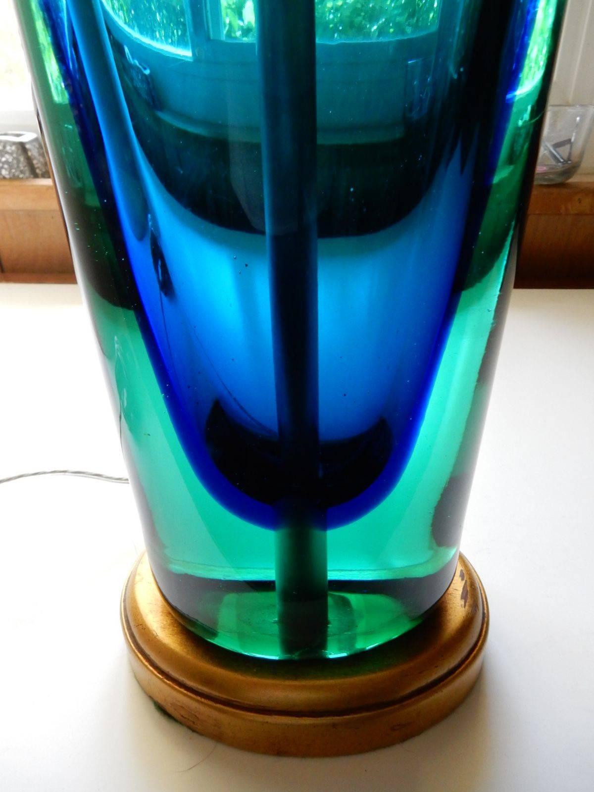 Gorgeous teal blue and aqua Sommerso art glass lamp by Flavio Poli, circa 1950.
Glass vase/body stands 20