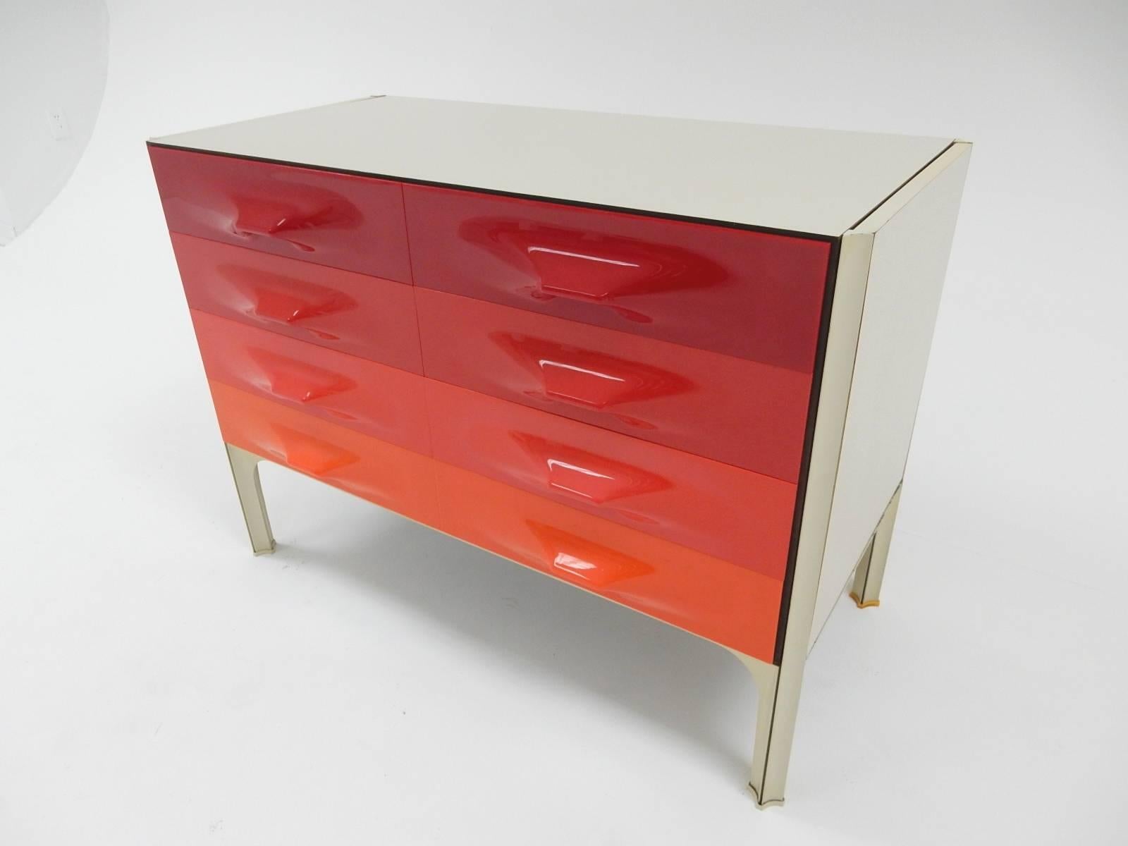 Amazing Mid-Century dresser designed by Raymond Loewy.
From the DF2000 X-line series with four color shades, rare.
Six drawers total. Beautiful piece of art furniture produced in 1968.
