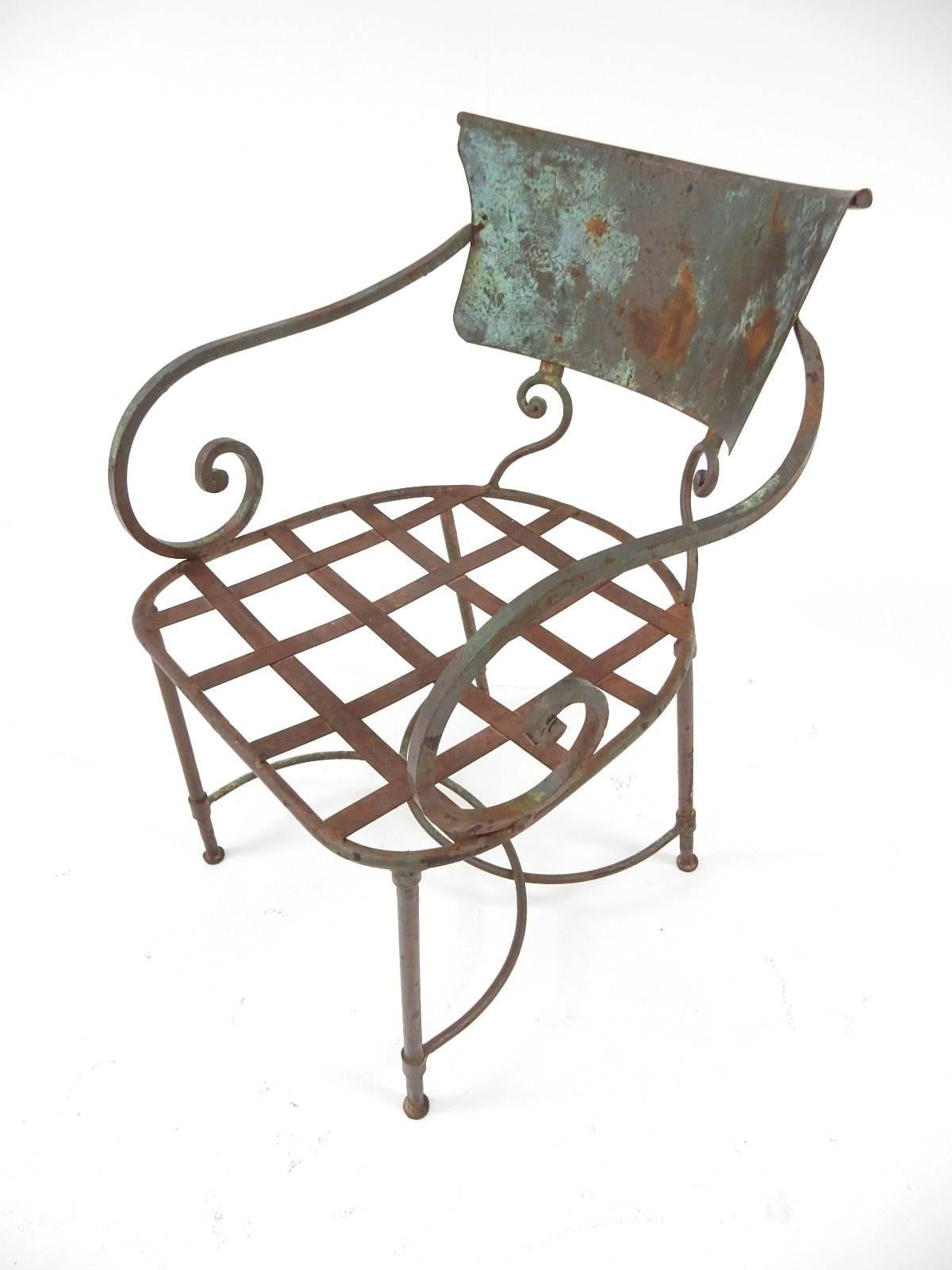 Amazing sculpted iron garden chairs. Very heavy and solid.
Completely original with beautiful aged paint and patina.
Sold individually.