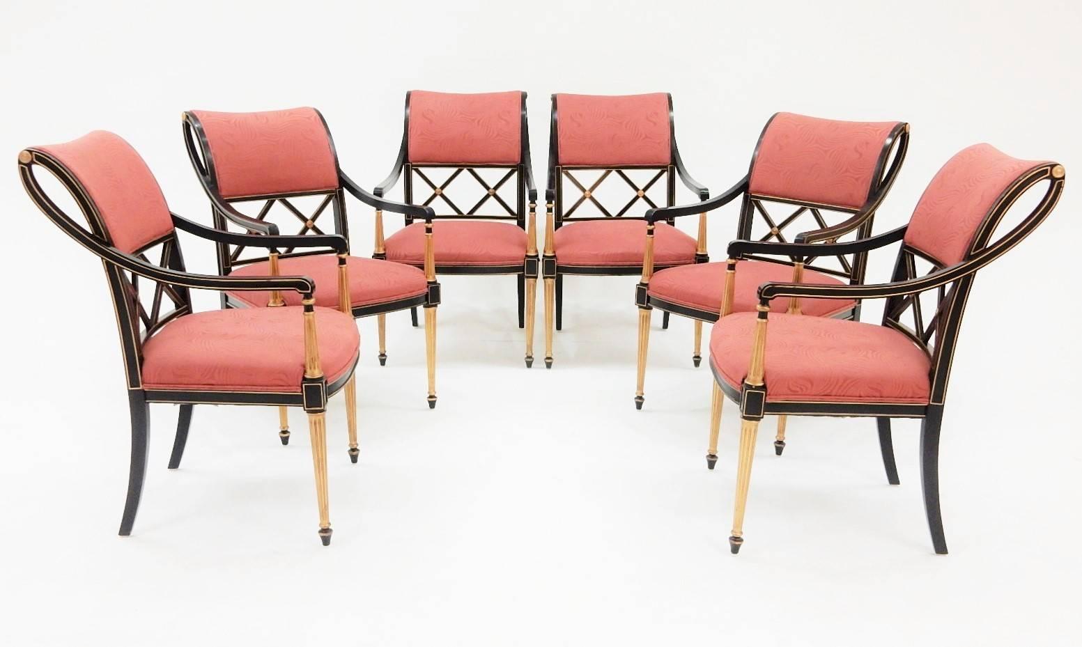 Rare set of 12 dining chairs designed by Dorothy Draper for Henredon Furniture.
Gorgeous sculptural chairs with double X back.
Black lacquer with gilded front legs and highlights.
Original upholstery.
All are structurally excellent with no