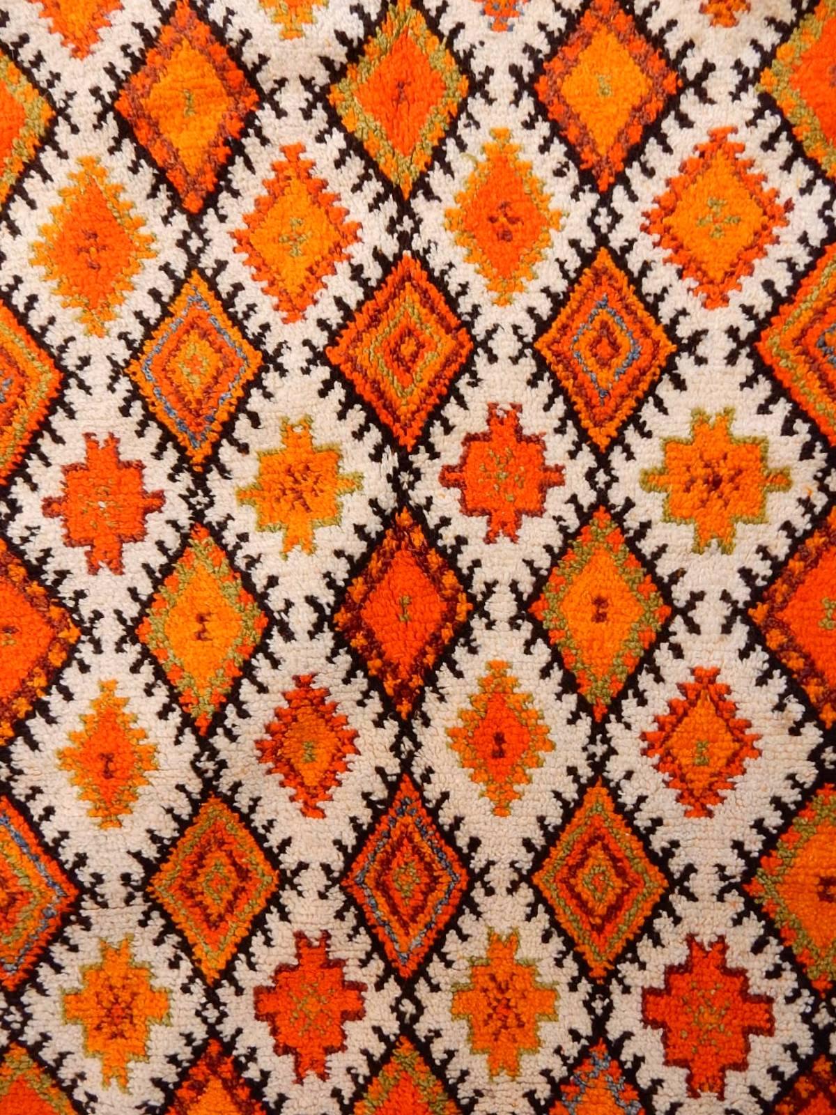 An amazing hand-hooked wool tapestry from 1960s.
Bold bright colors. Fringe edge at bottom. Six wooden rings on top.
Clean and odorless with no fade. Measures: 8 feet x 4-1/2 feet.