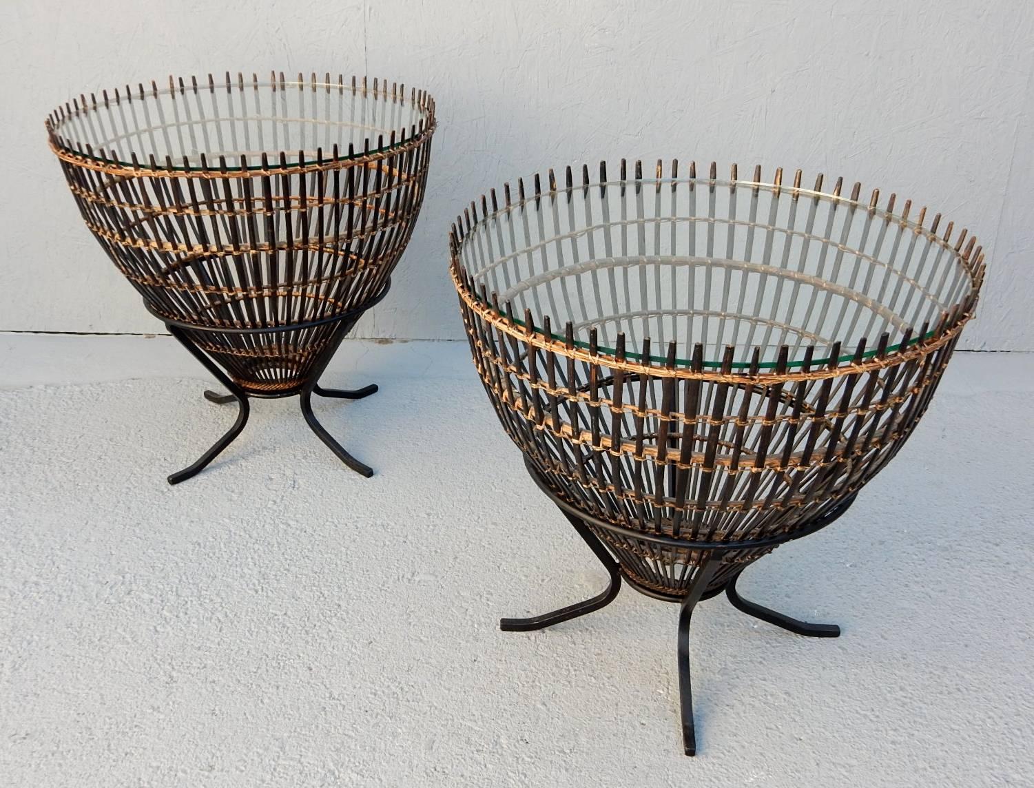 Sculptural fish trap baskets set upside down on custom iron stands with inset glass tops.
Designed by Franco Albini for Raymor.
Both are solid and in excellent original condition.
