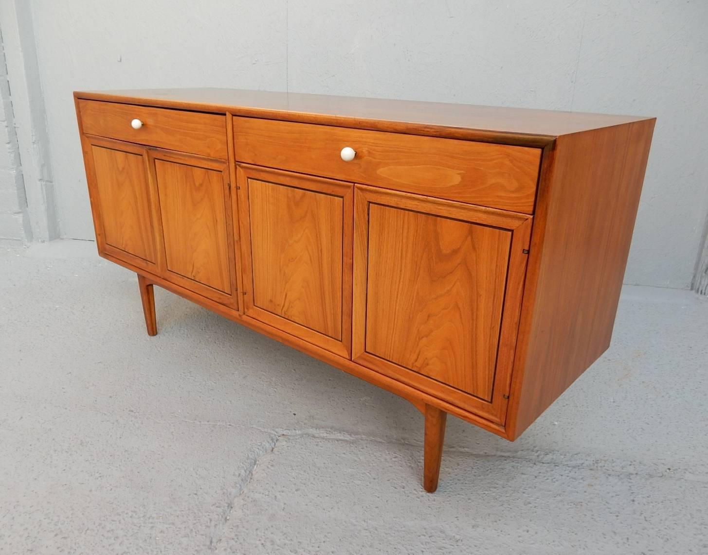 Gorgeous Drexel "Declaration" buffet designed by Kipp Stewart.
Immaculate condition. Two top drawers and two double cabinets with small lighted interior.