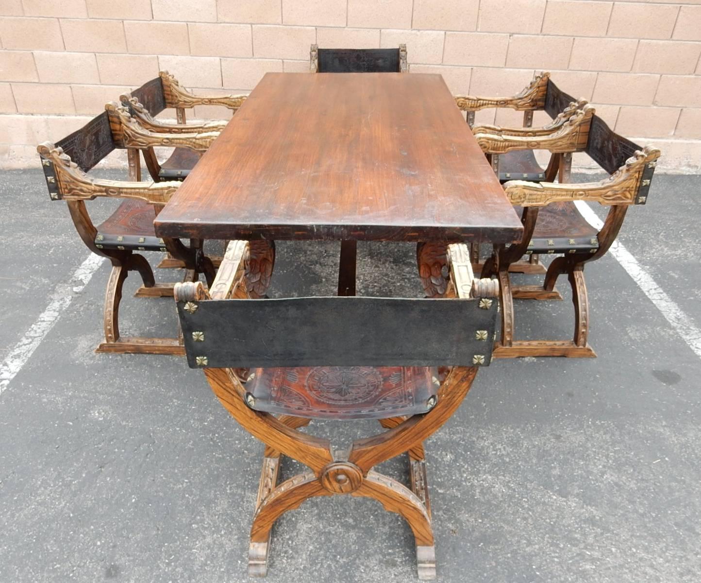 Spanish Colonial Dining Table with Six Elaborate Carved Wood and Leather Chairs 1