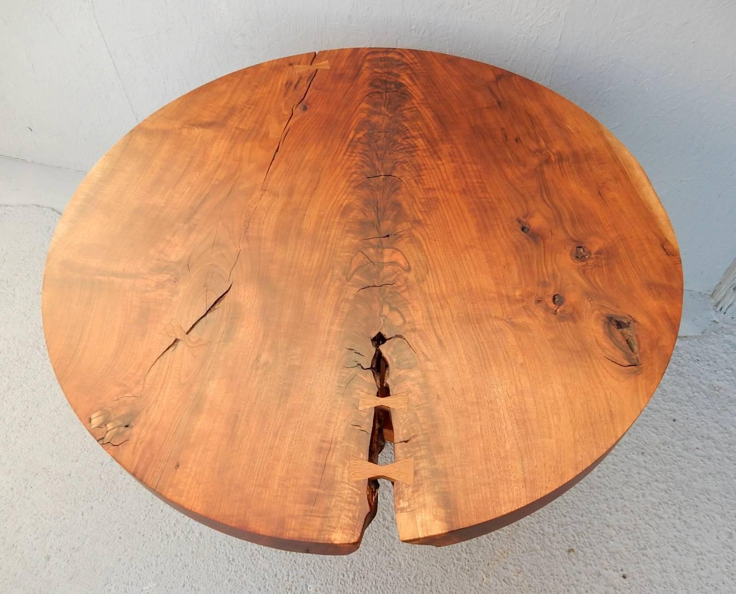 From the Los Angeles studio of Nick Offerman (Actor/woodworker)a gorgeous handmade custom California Claro walnut foyer or breakfast table.
An amazing work of art. Signed on both underside of top and top of base.
Measures: 38 in. wide X 29 in.