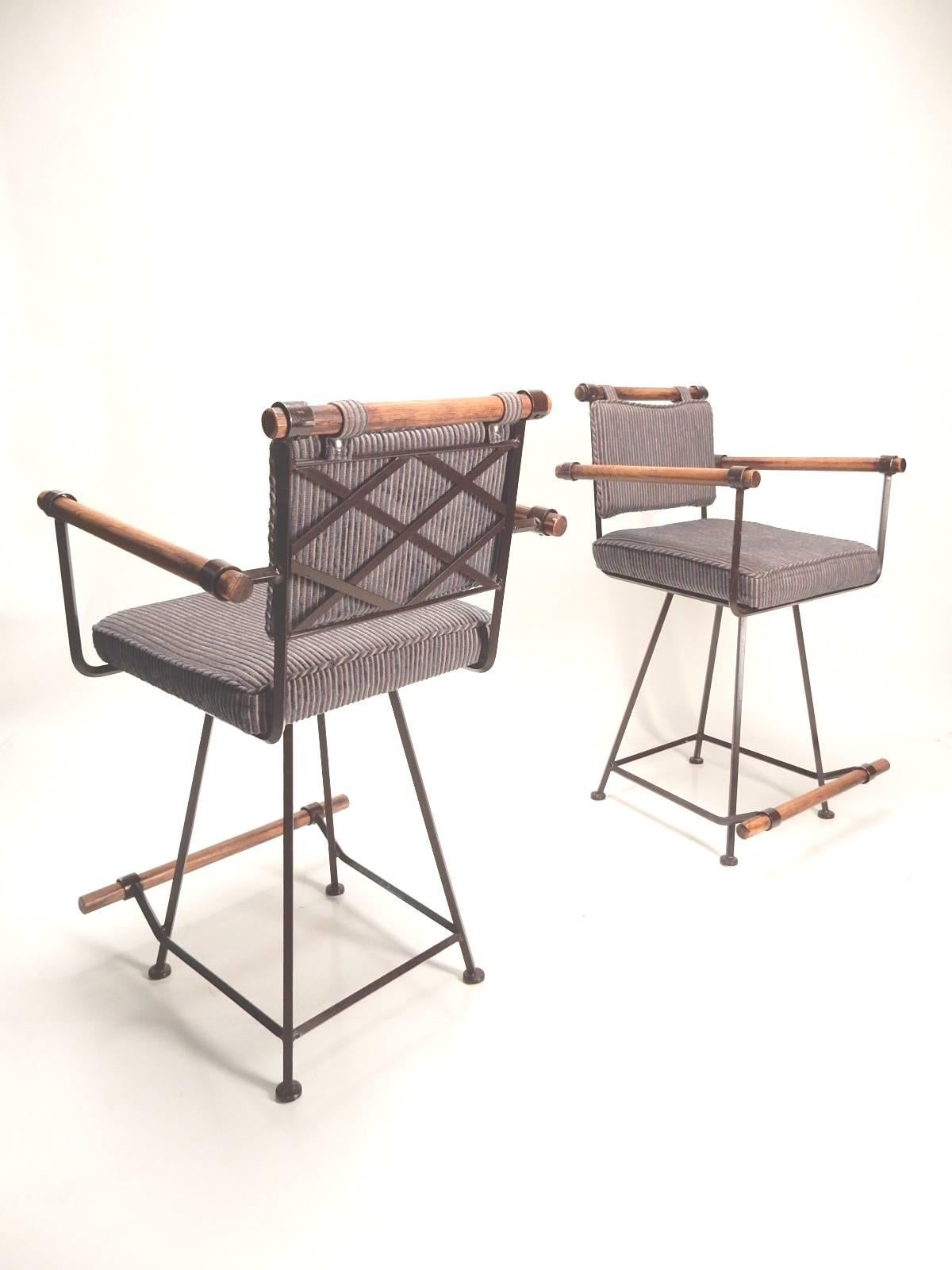 Southern California Modernism at its finest, these three wood and iron bar stools were designed by Cleo Baldon, circa 1964.
Manufactured by Inca Products of Santa Fe Springs, CA.
They are in excellent condition and completely original.