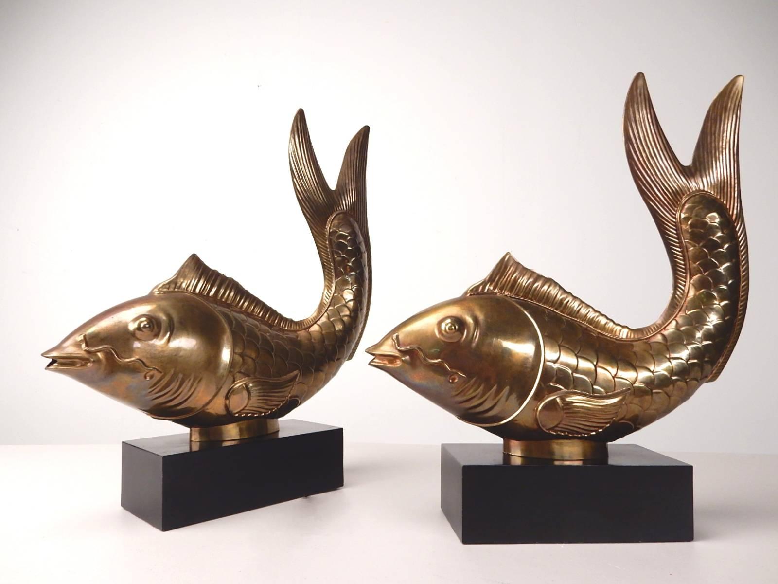 Extraordinary pair of huge solid brass Koi on lacquered wood plinth by the Chapman Lamp CO. dated 1977.
Fabulous aged patina on brass. Mint condition.