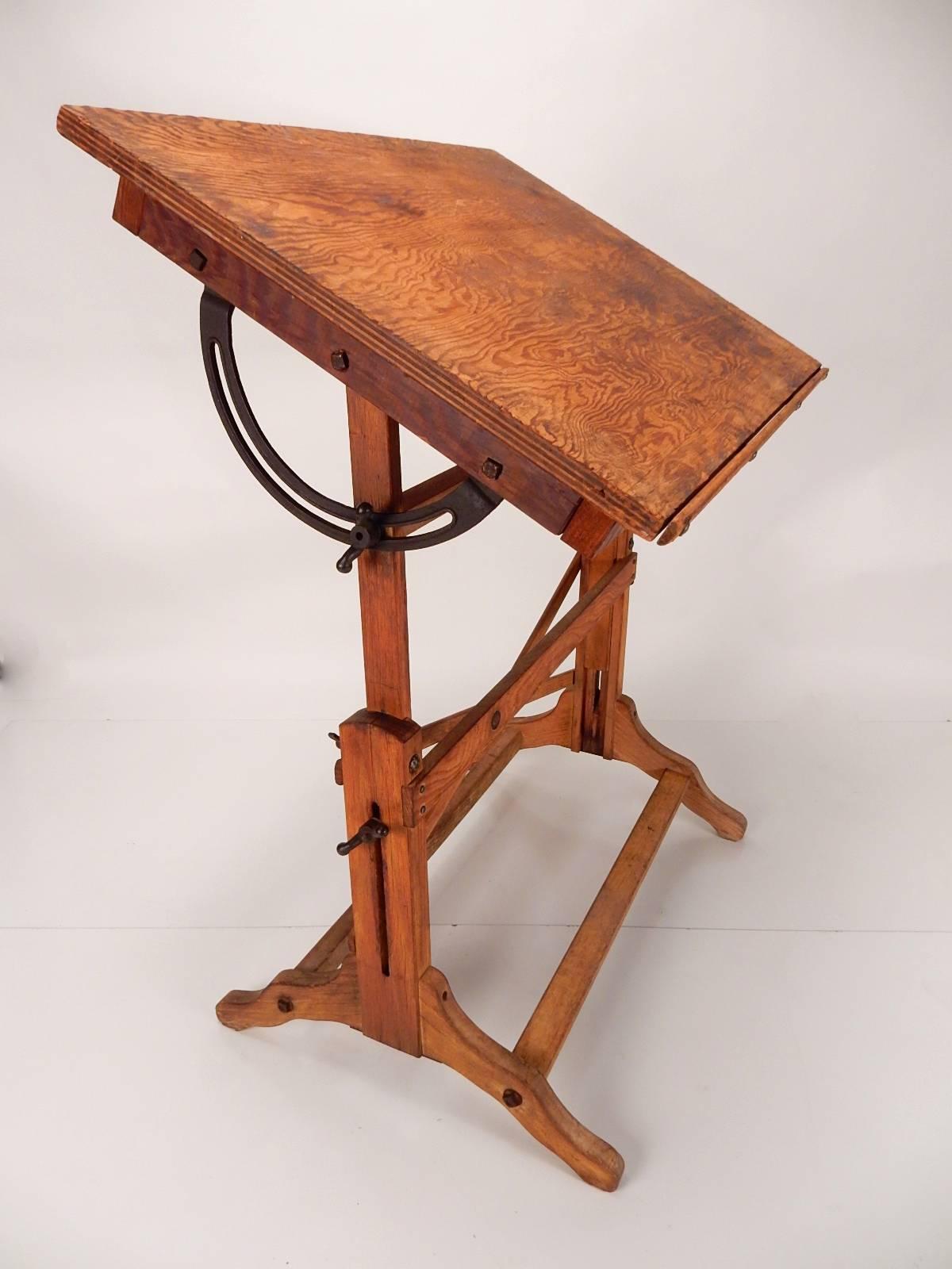 Small-scale drafting table by Post Drafting Materials,
circa 1930s. Completely original and un-restored.
Every adjustment works smooth and easy.