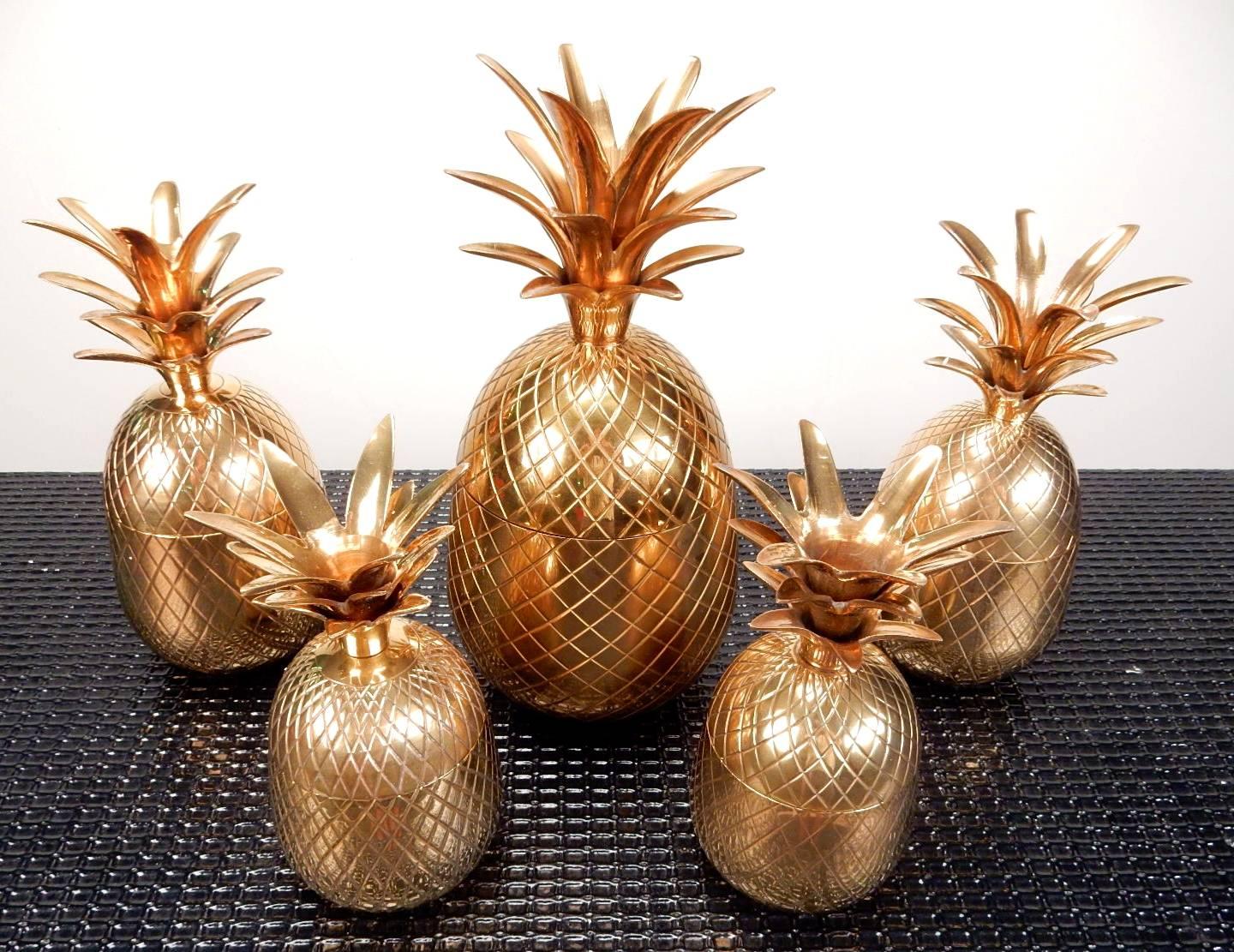 Instant collection of five solid brass Pineapple shape boxes by Frederick Cooper of Chicago.
An amazing table top display.
They range from largest is 12-1/2 inch tall to two smallest are 7 inch tall.
circa 1970s, all are in very good