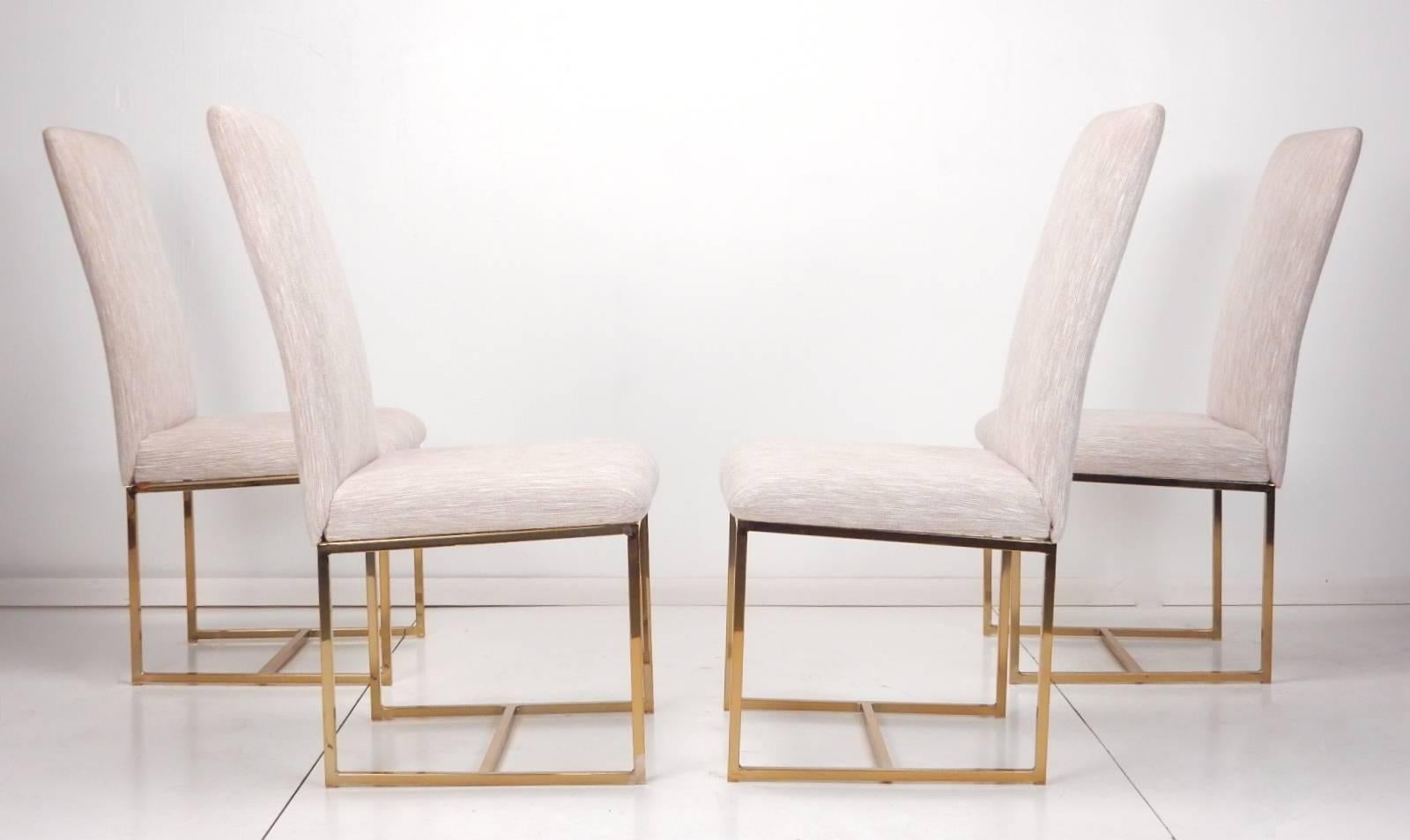Set of six brass-plated steel box tube frame dining chairs in the style of Milo Baughman.
Two captain chairs and four sides. Fine woven fabric upholstery in excellent condition, 
circa 1980, made in California.