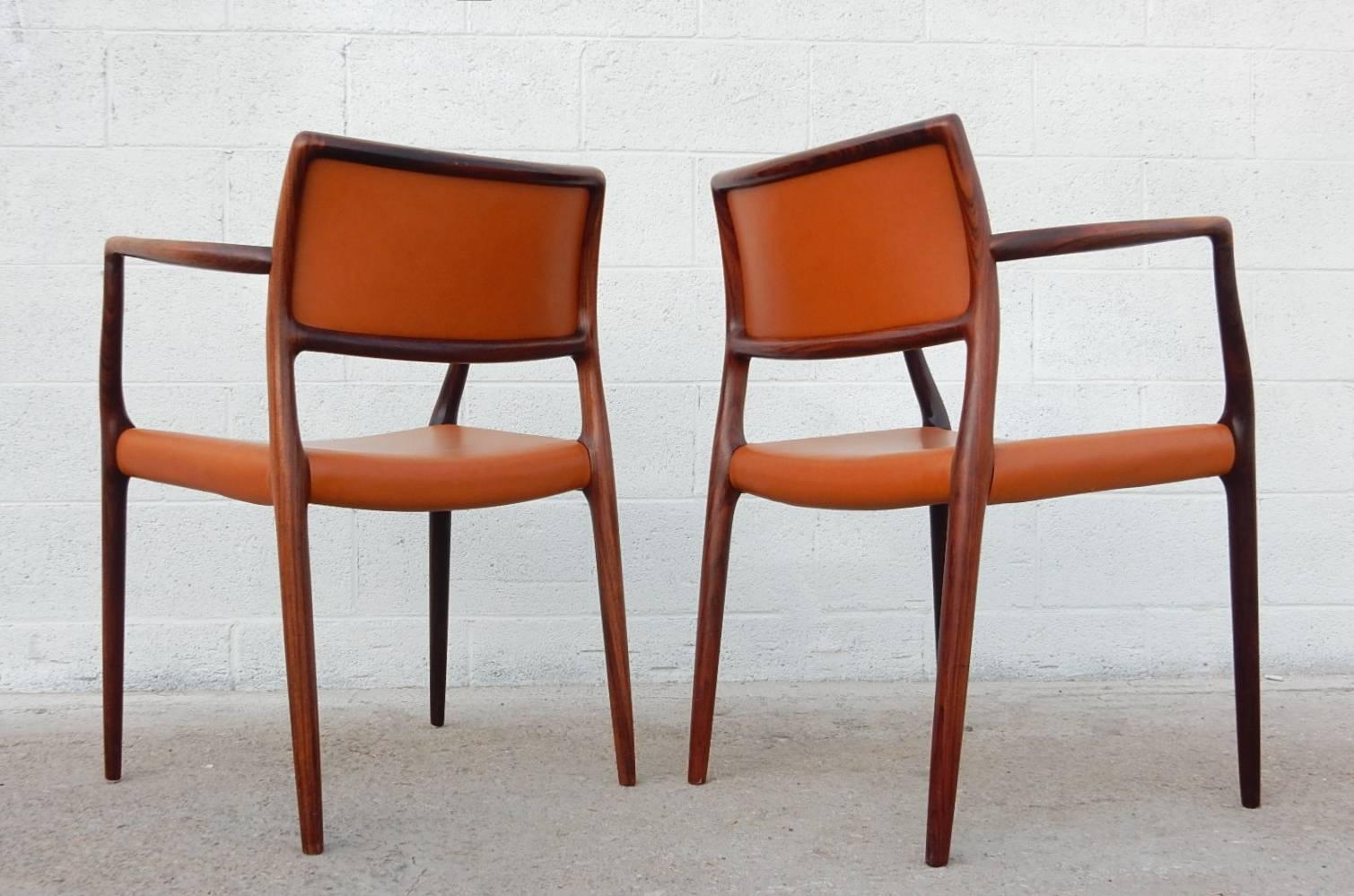 8 Mid-Century Danish Modern Niels Otto Møller Mod. 65 Leather Dining Armchairs In Good Condition In Las Vegas, NV