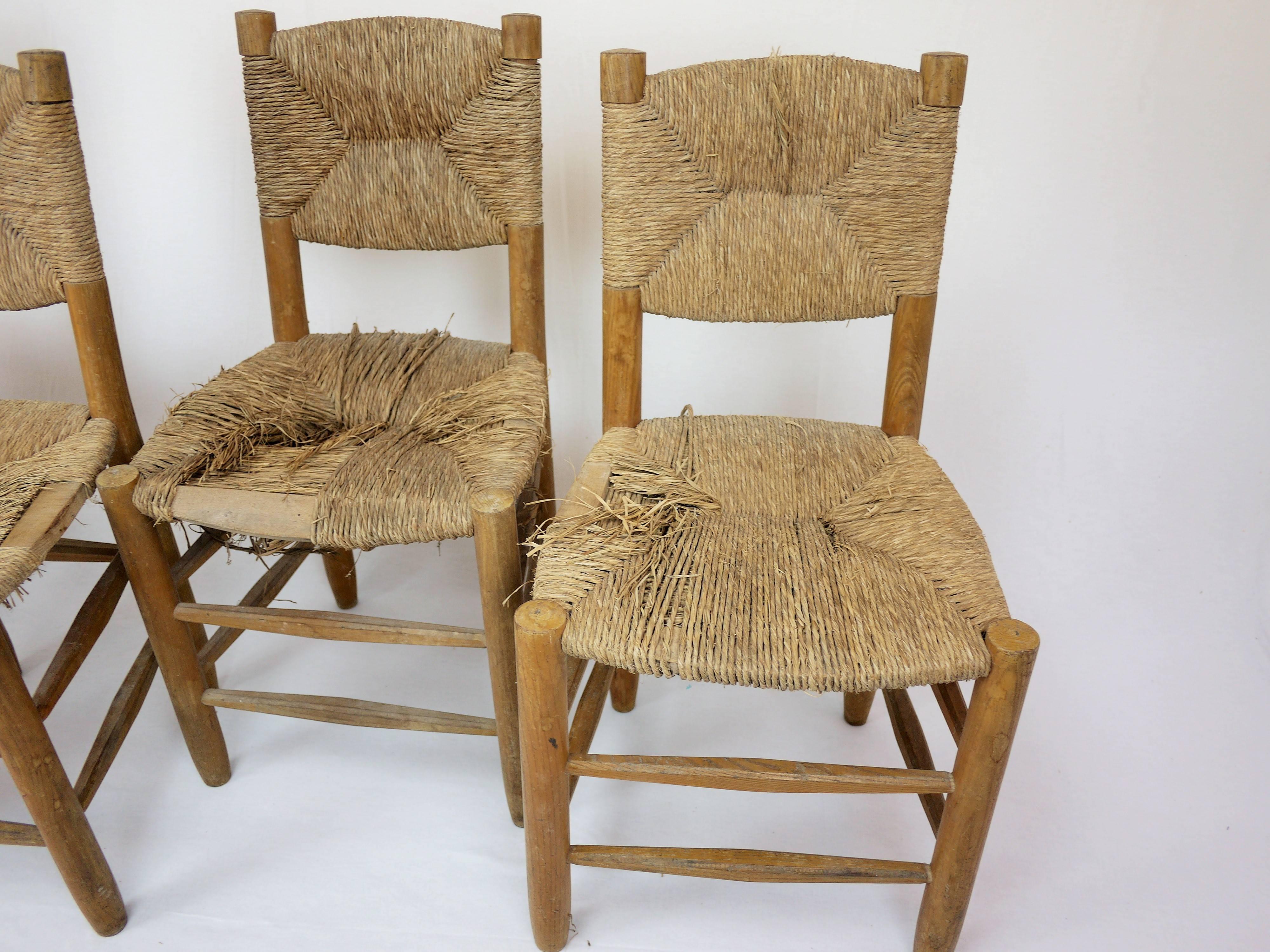Mid-20th Century Set of Four Rush Chairs by Charlotte Perriand For Sale