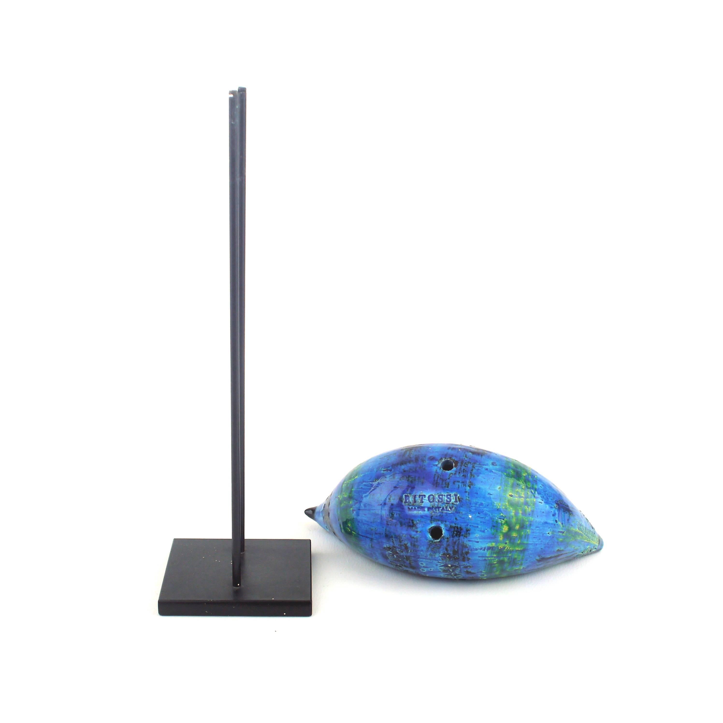 Blue ceramic bird on metal base designed by Aldo Londi, artistic director of Bitossi in 1950s.
 