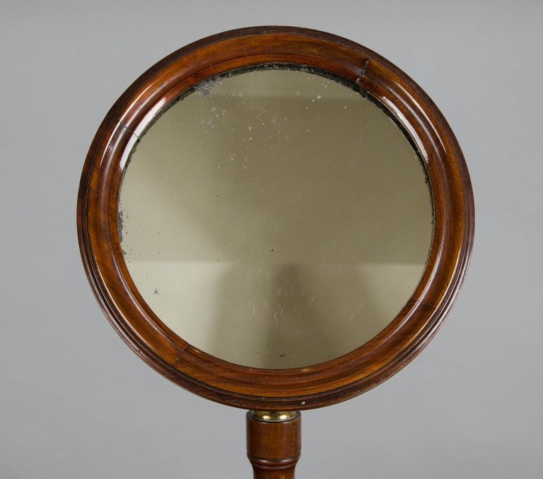 A mahogany, 19th century shaving modesty stand, with adjustable mirror.  Once the property of Lord Armstrong-Jones' mother.