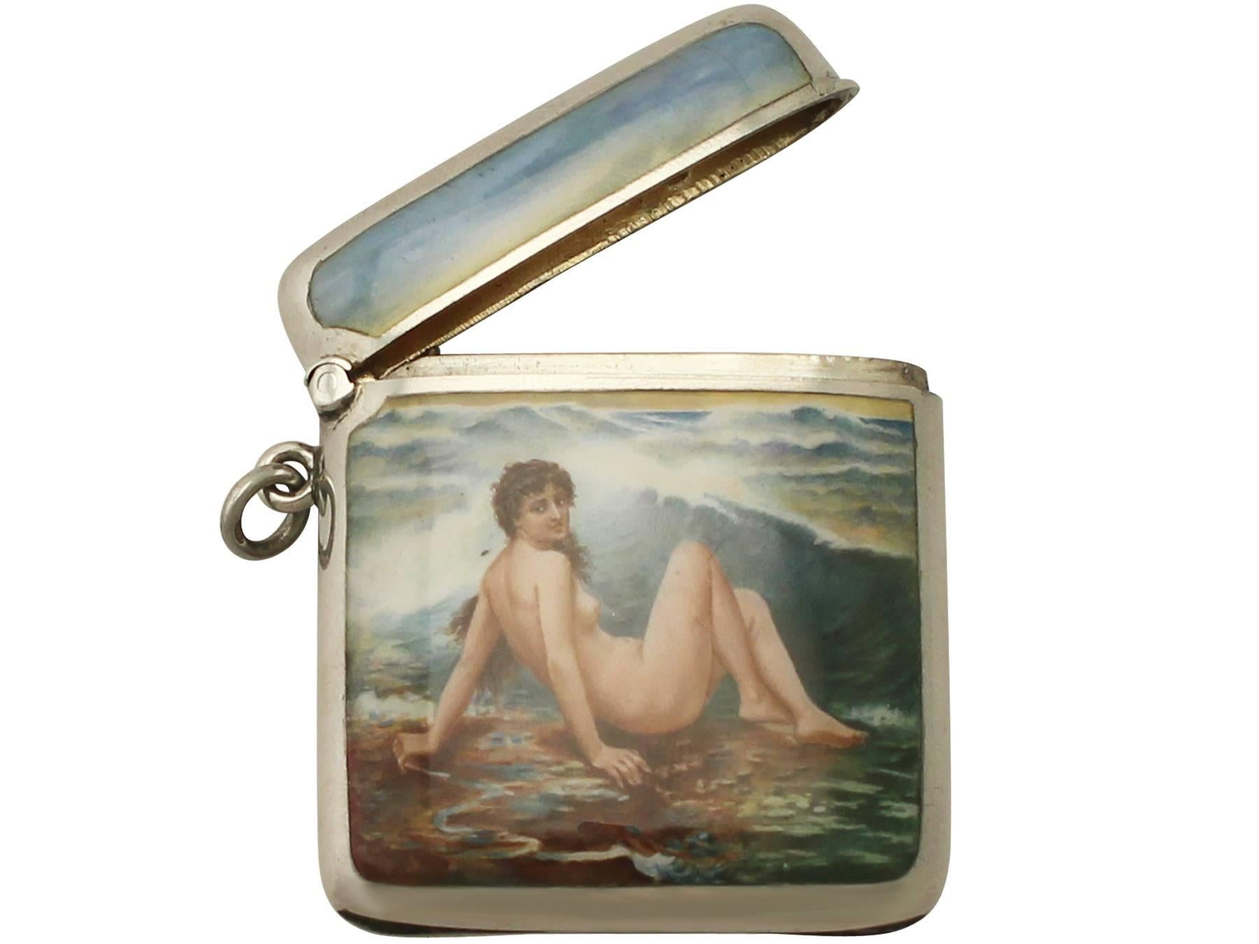 An exceptional, fine and impressive antique Edwardian English sterling silver and erotica enamel vesta case; an addition to our range of collectable silver cases.

This fine antique sterling silver vesta case has a plain rectangular rounded