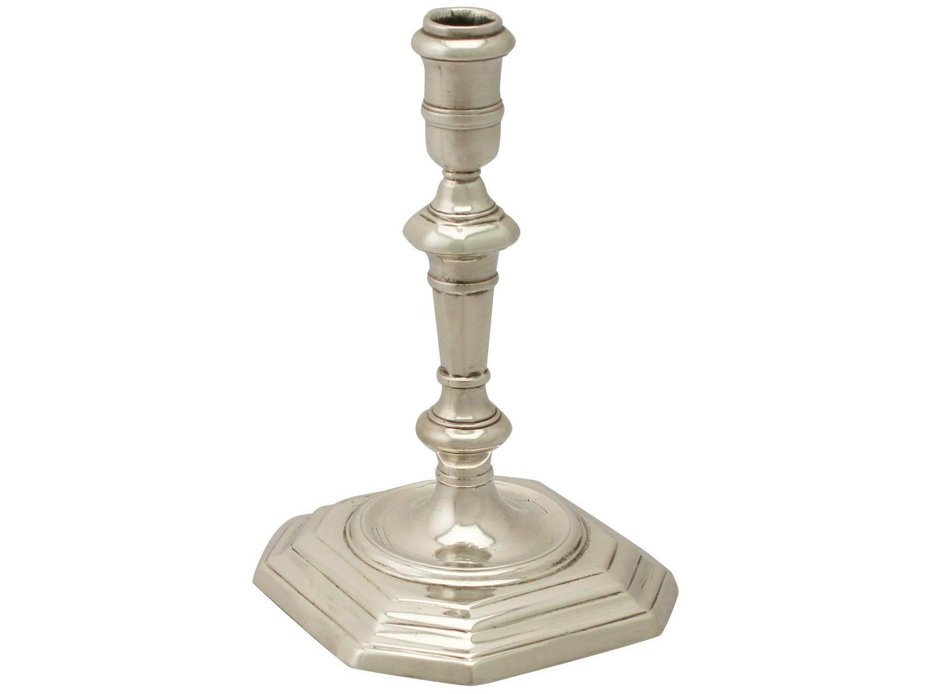 An exceptional, fine and impressive antique early Georgian English cast sterling silver taperstick; an addition to our ornamental silverware collection

This exceptional antique George I cast sterling silver taperstick has a plain classical