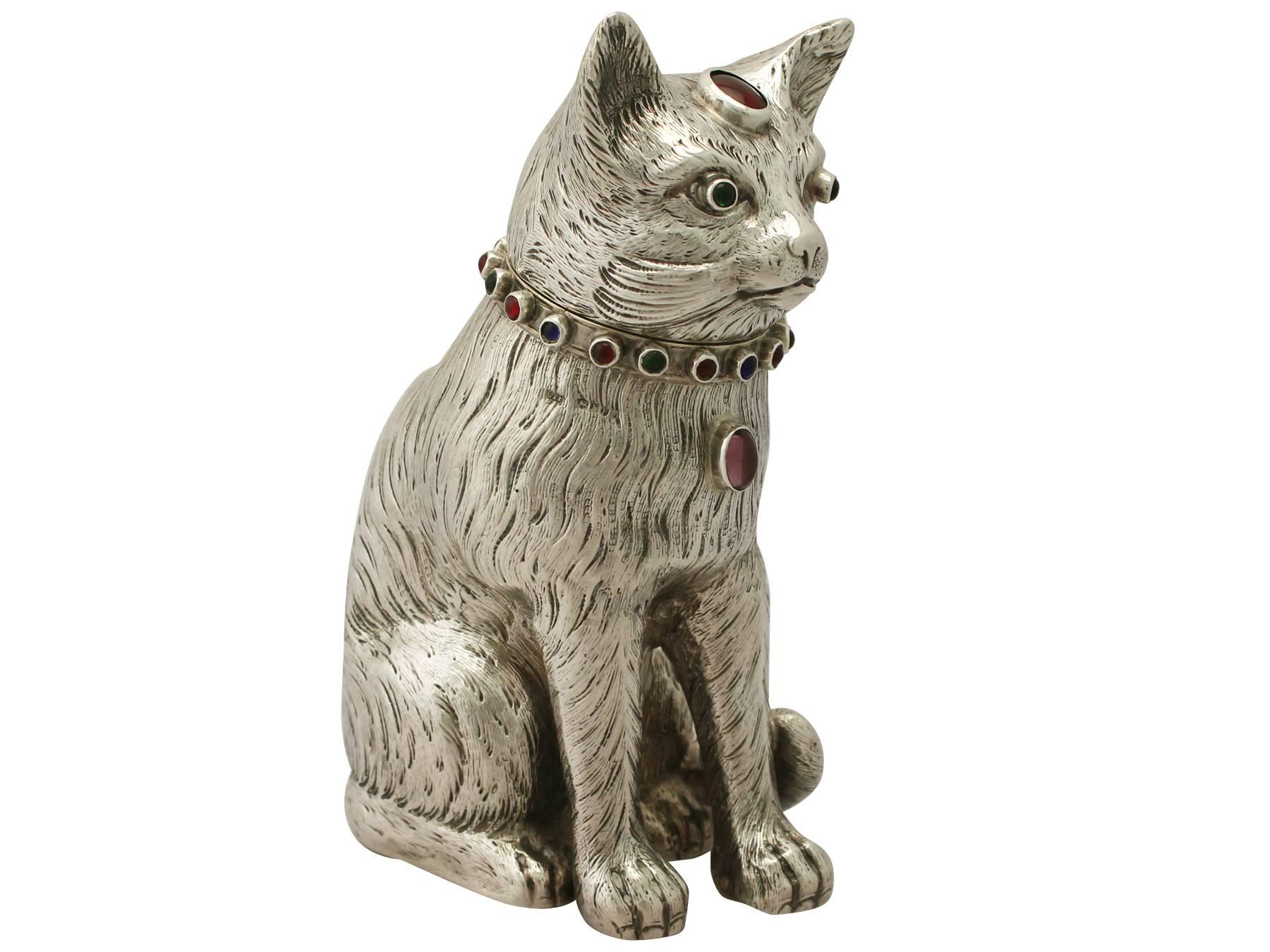 An exceptional, fine and impressive antique Edwardian sterling silver sugar box modelled in the form of a cat; an addition to our silver teaware collection.

This exceptional antique Edwardian sterling silver sugar box has been realistically