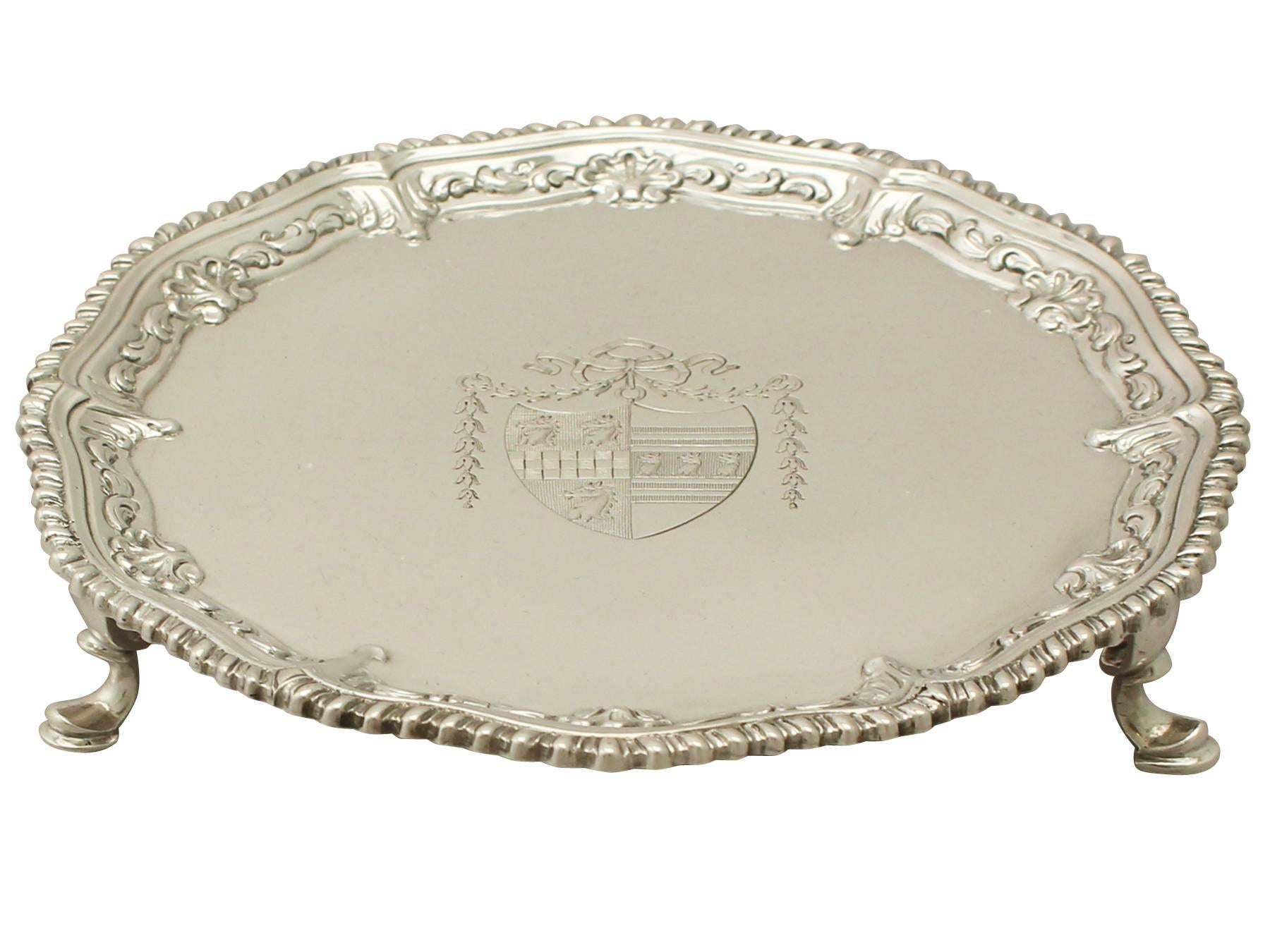 An exceptional, fine and impressive antique George III English sterling silver waiter; an addition to our Georgian dining silverware collection.

This impressive antique George III waiter in sterling silver has a circular shaped form.

The