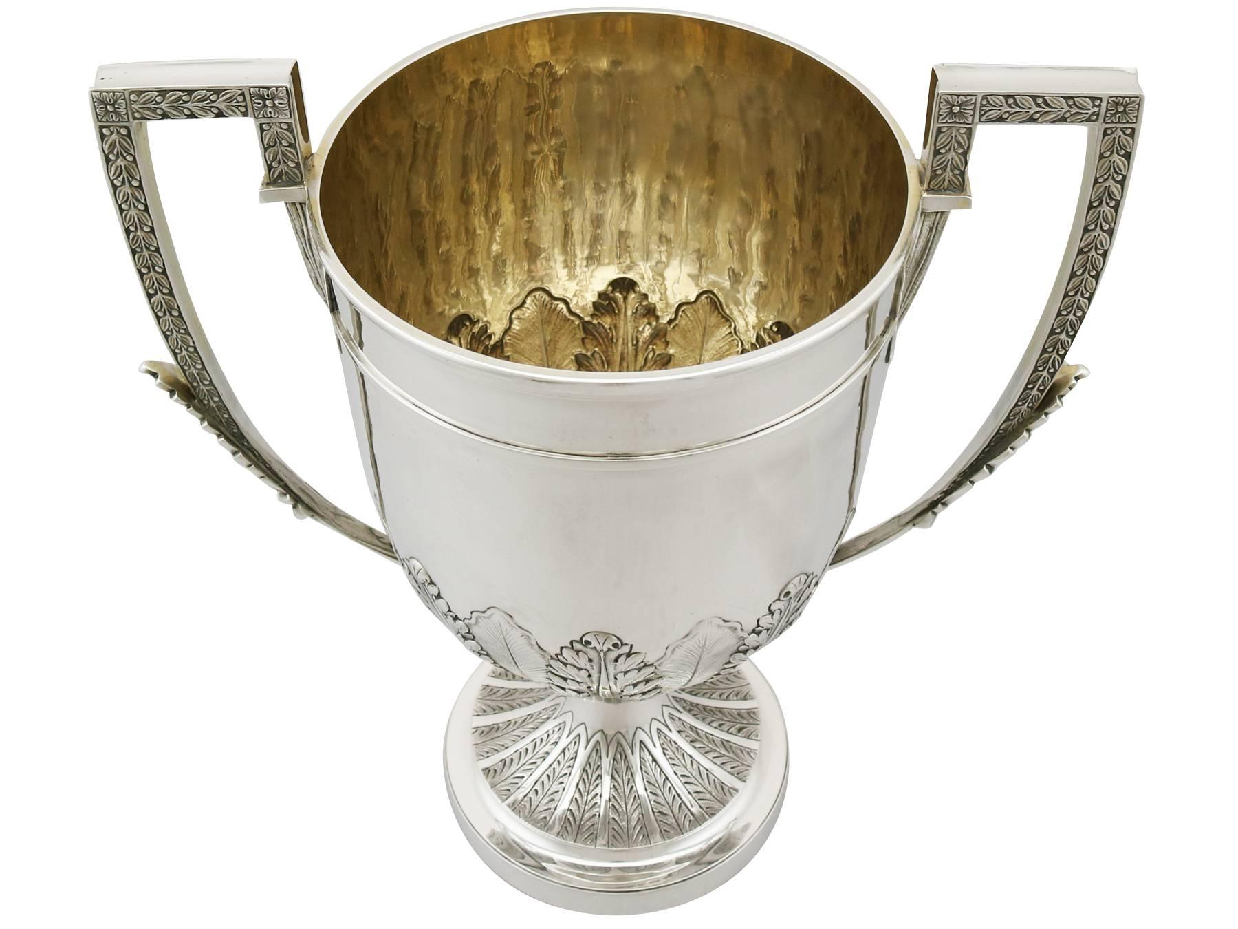 An exceptional, fine and impressive, large antique Victorian English sterling silver presentation trophy cup made by Charles Stuart Harris; an addition to our ornamental silverware collection

This exceptional antique Victorian large silver trophy