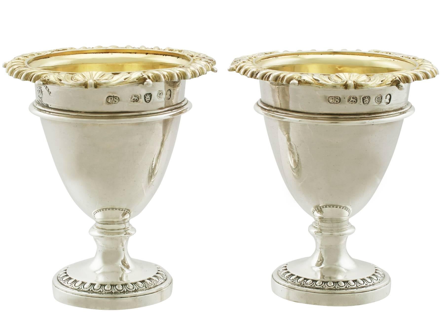 An exceptional, fine and impressive pair of antique George IV English sterling silver egg cups made by Paul Storr part of our dining silverware collection.

These exceptional antique George IV sterling silver egg cups have a bell shaped form to a