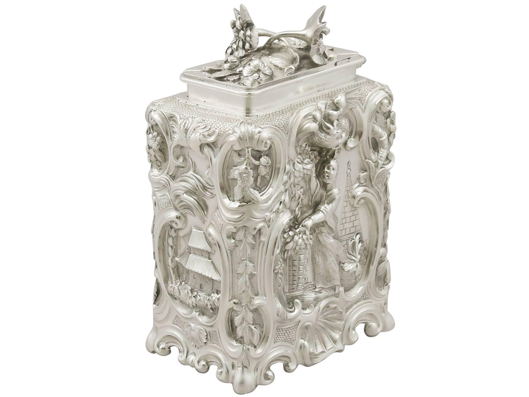 A magnificent, fine and impressive antique Georgian English sterling silver tea caddy; an addition to our silver teaware collection

This magnificent antique George III sterling silver tea caddy has an oblong shaped form.

The anterior and
