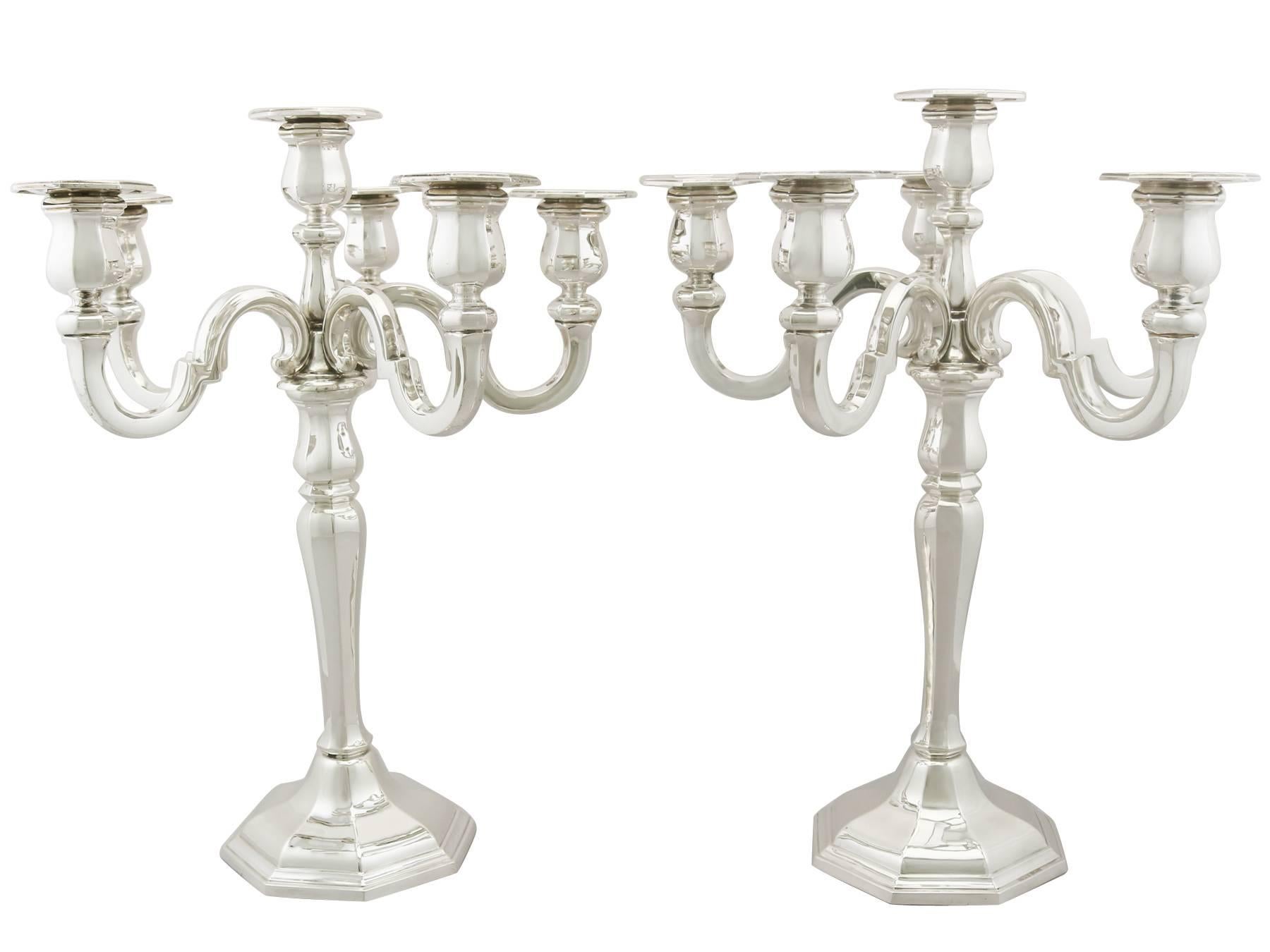 An exceptional, fine and impressive, pair of large antique German sterling silver 6 light candelabra; an addition to our ornamental continental silverware collection

These exceptional antique German six-light candelabra in sterling silver have a