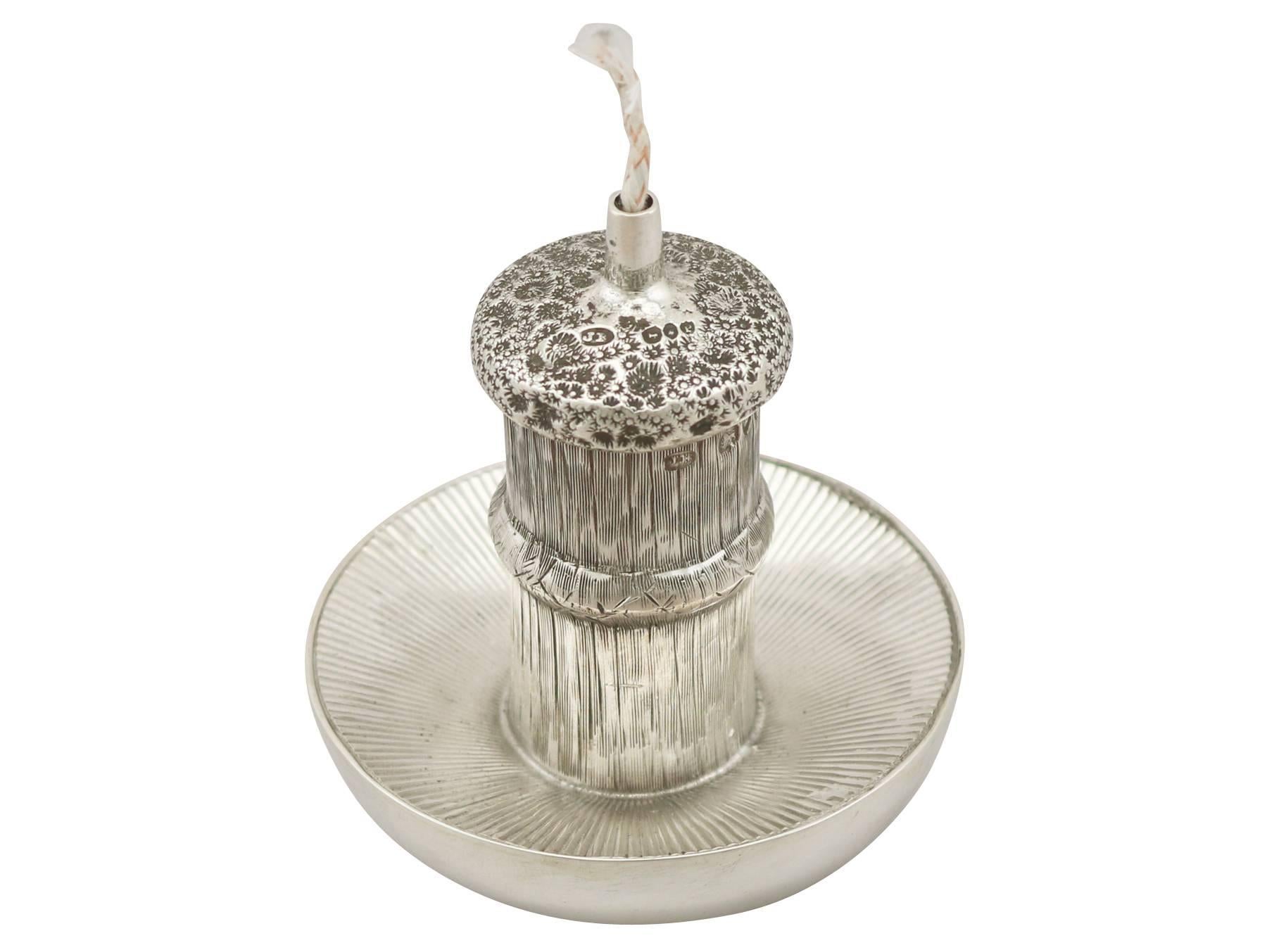 An exceptional, fine and impressive antique Victorian English sterling silver cigarette/cigar table lighter modelled in the form of a mushroom; an addition to our smoking related silverware collection.

This exceptional antique Victorian cast