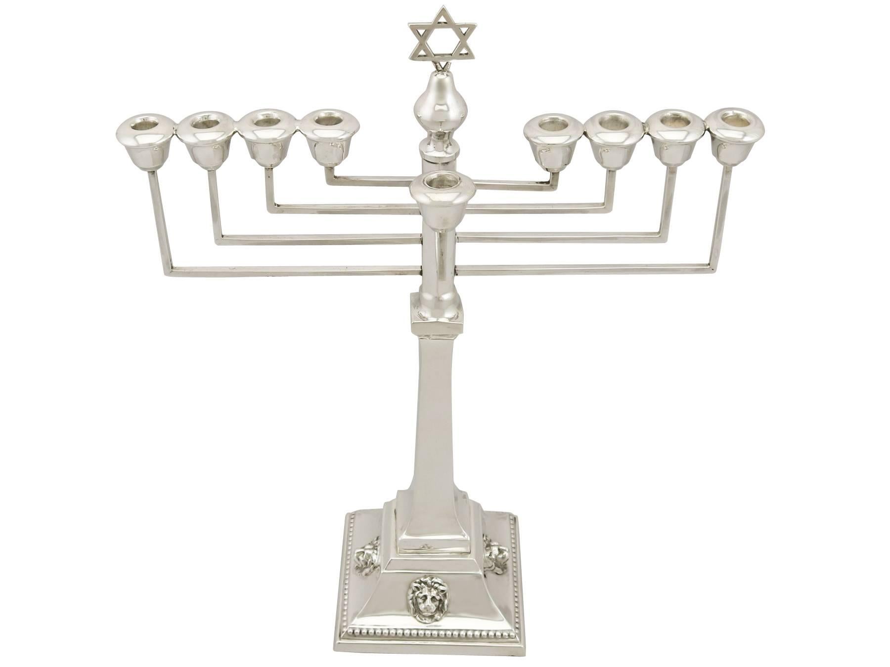 
An exceptional, fine and impressive antique George V English sterling silver Hanukkiah made by A Taite & Sons Ltd; an addition to our ornamental silverware collection

This exceptional antique sterling silver Hanukkiah* has plain circular