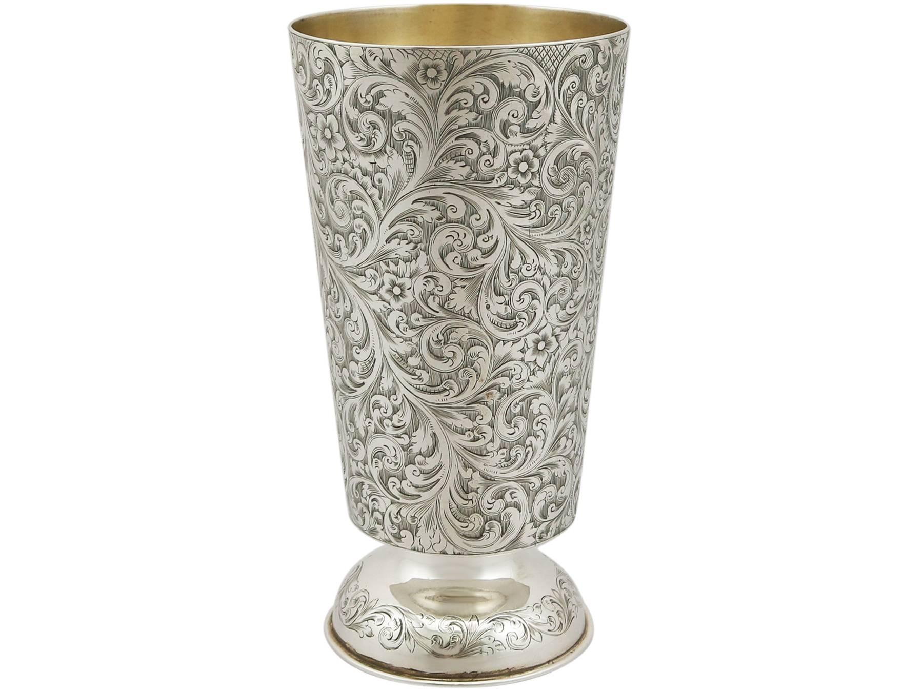 An exceptional, fine and impressive antique Indian silver vase; an addition to our Asian silverware collection.

This exceptional antique Indian silver vase has a tapering cylindrical form onto a circular doomed foot.

The surface of this silver