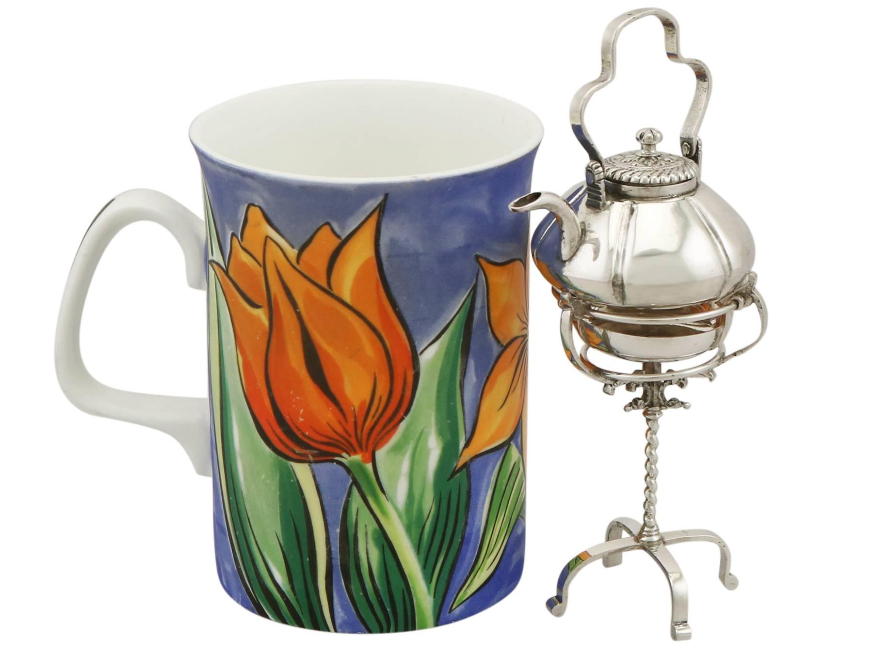 An exceptional, fine and impressive antique 18th century Dutch silver miniature spirit kettle; an addition to our diverse silver teaware collection

This exceptional antique Dutch silver miniature spirit kettle has a pumpkin shaped form.

Each