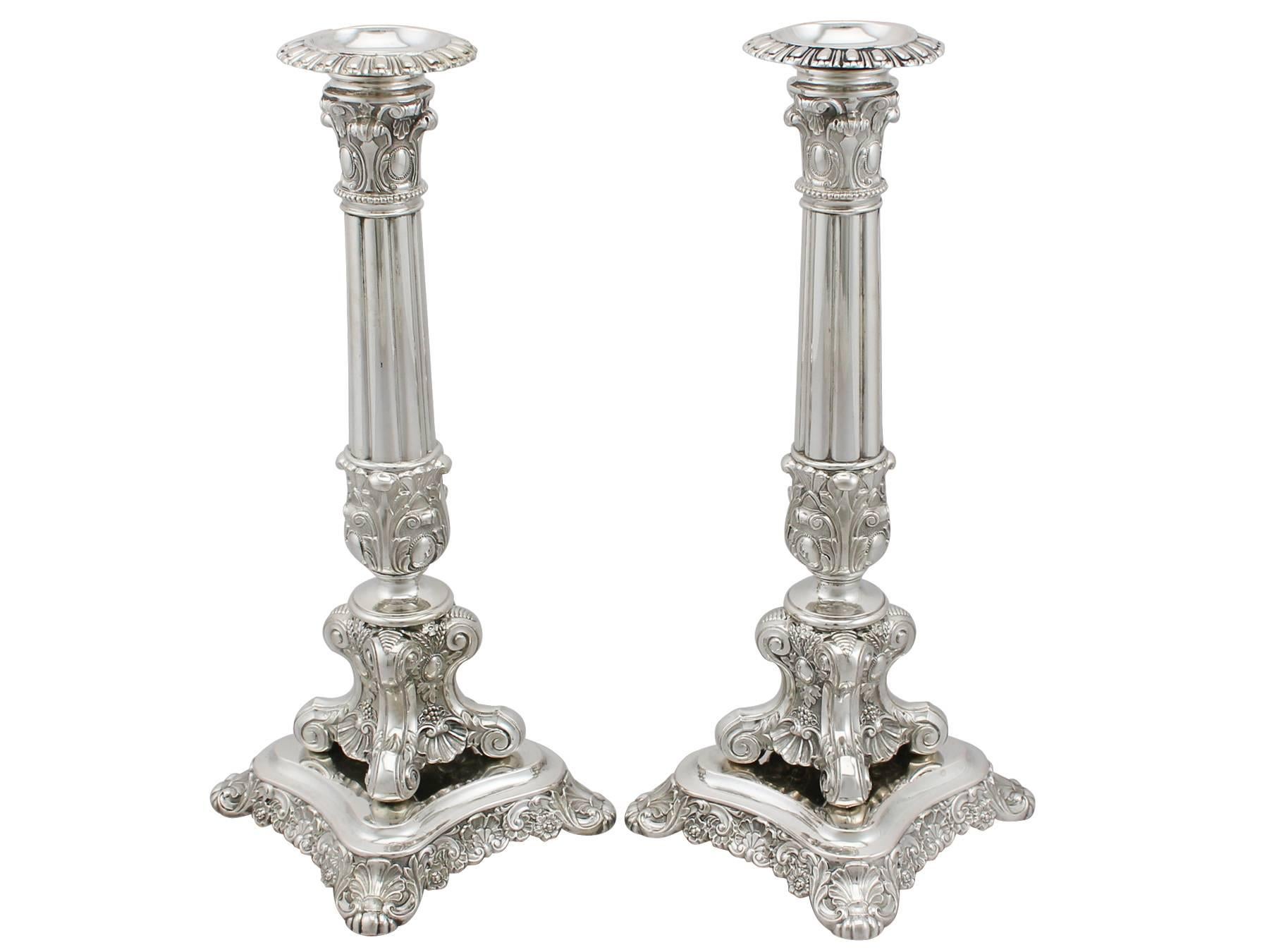 A fine and impressive pair of antique German silver candlesticks; an addition to our ornamental silverware collection

These antique German silver candlesticks have a circular shaped form to a scrolling boss and rounded base.

The candlesticks