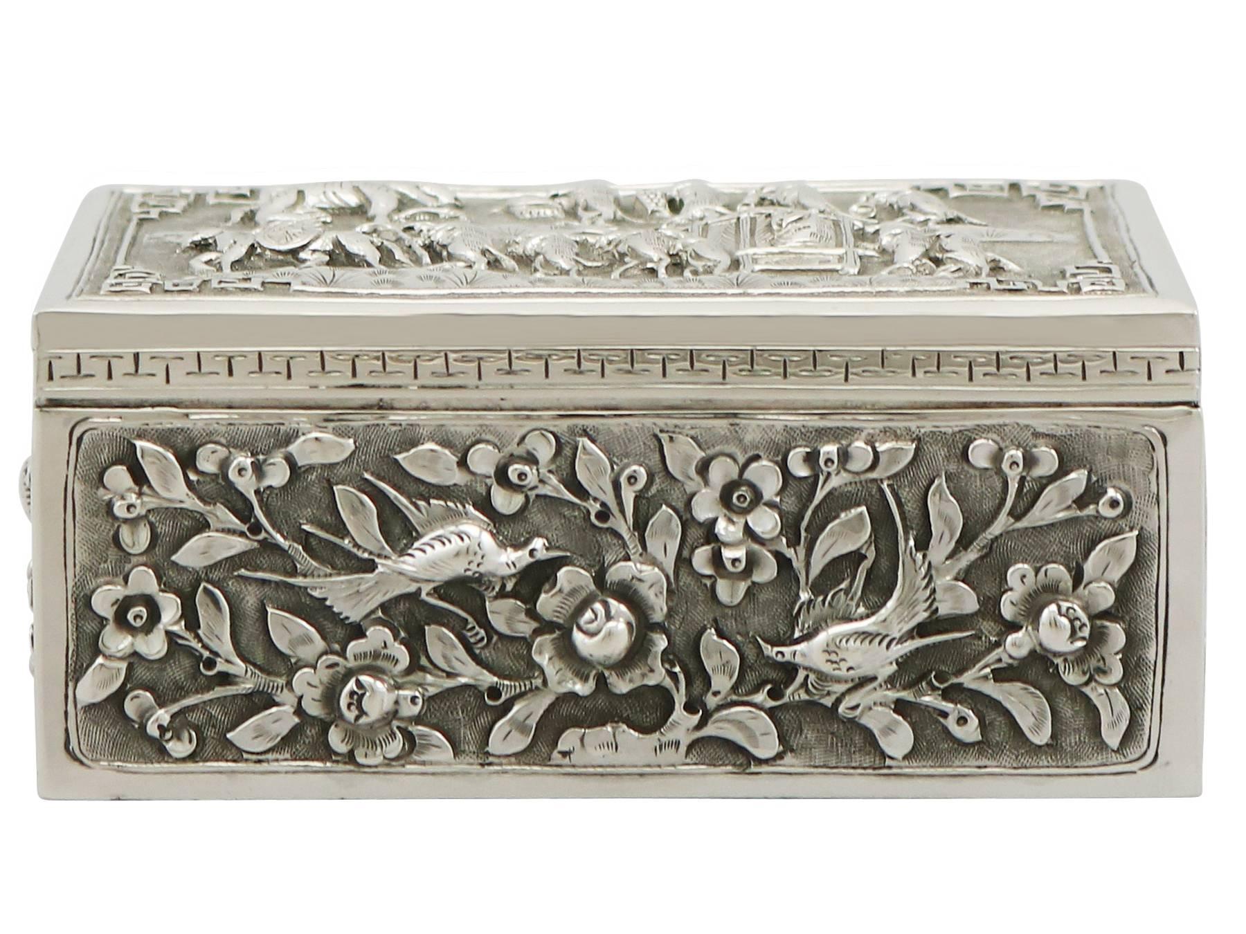 An exceptional, fine and impressive antique Chinese Export silver box; an addition to our oriental silver collection.

This exceptional antique Chinese Export Silver (CES) box has a rectangular form. The surface of this silver box is embellished