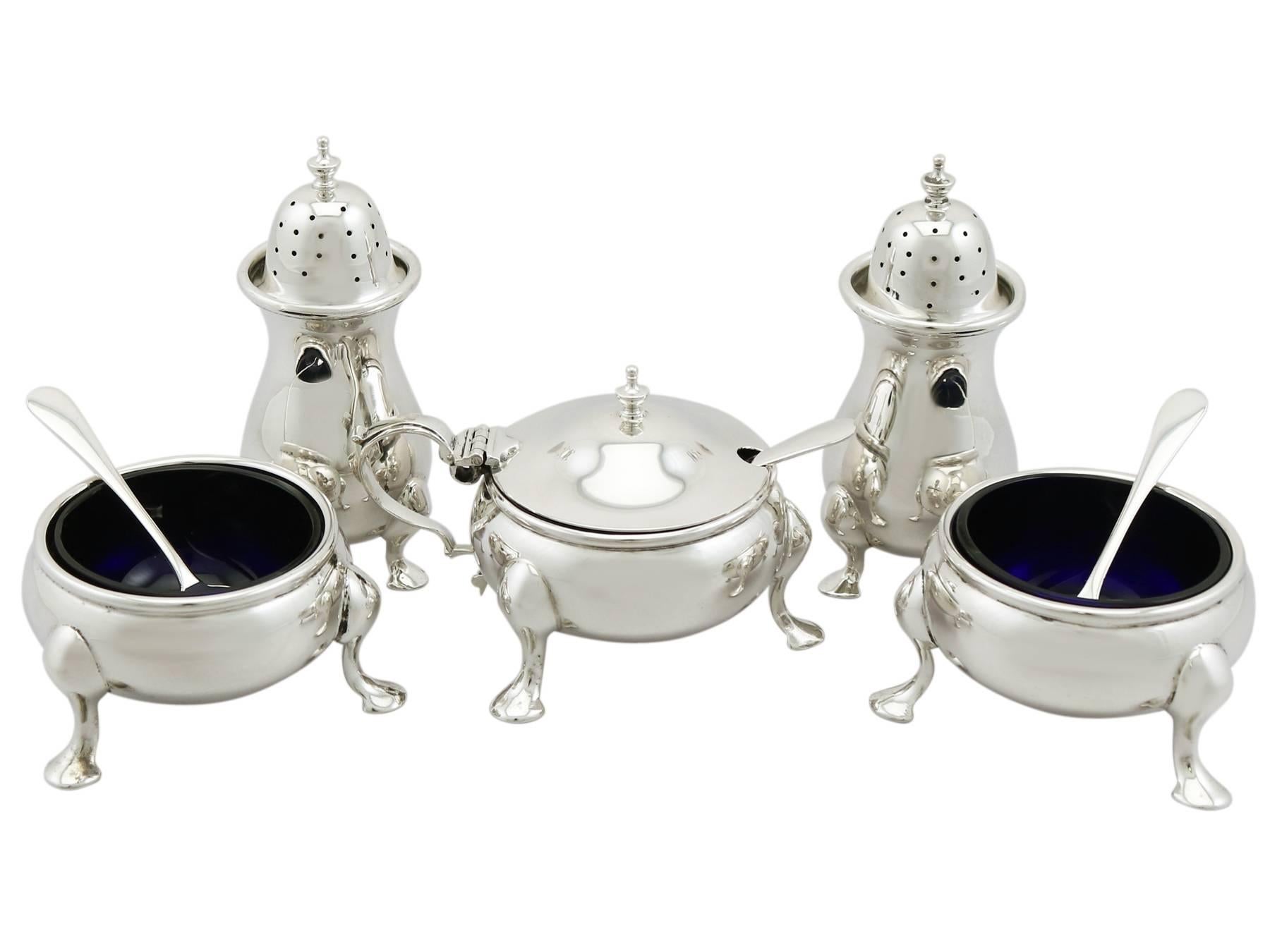 An exceptional, fine and impressive antique George VI English sterling silver five piece condiment set - boxed; an addition to our dining silverware collection.

This exceptional antique George VI five piece condiment set in sterling silver