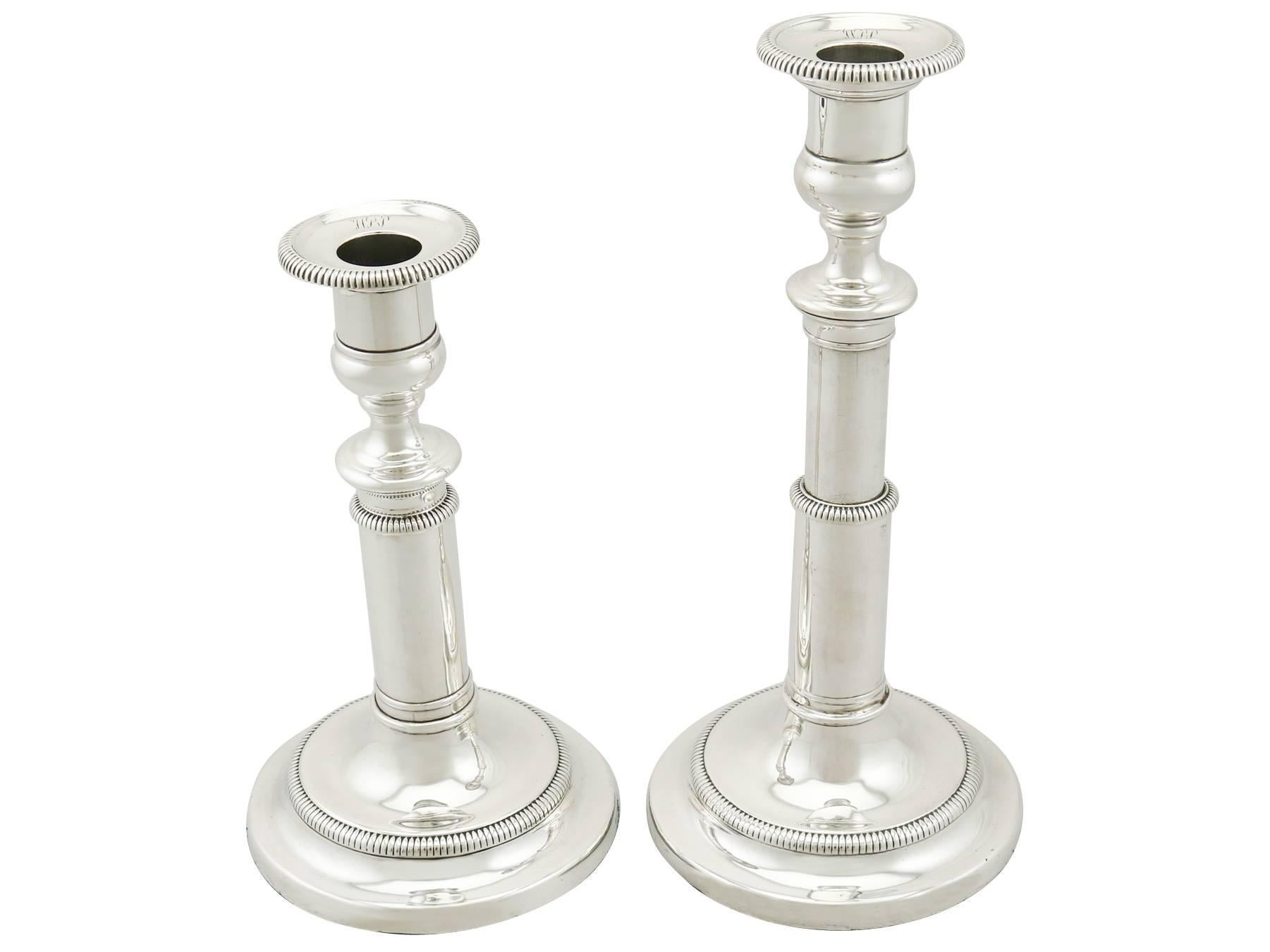An exceptional, fine and impressive pair of antique Georgian English sterling silver telescopic candlesticks; an addition to our Sheffield silverware collection

These exceptional antique Georgian sterling silver telescopic candlesticks have a
