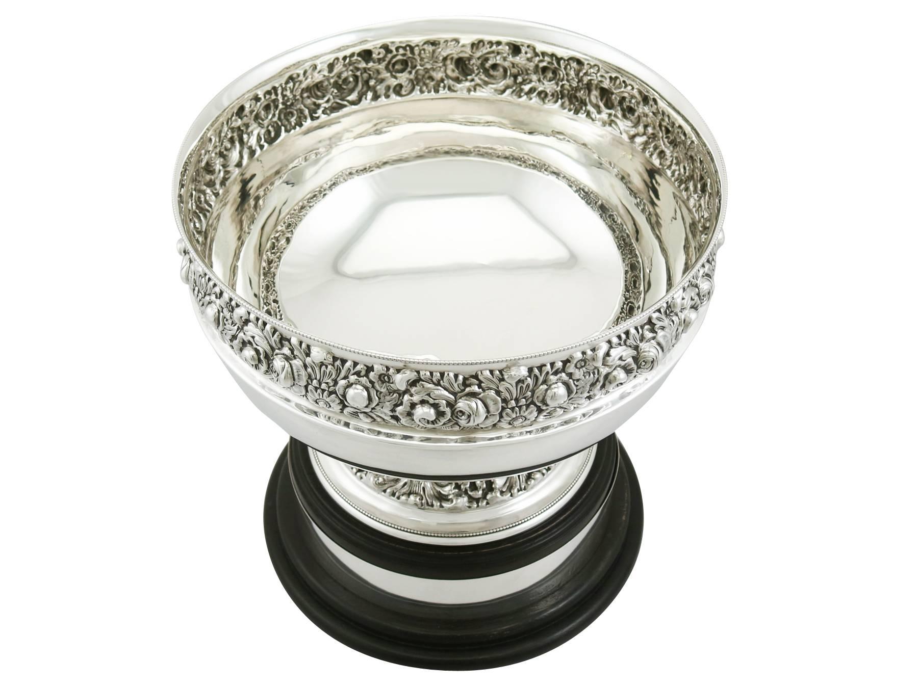 A fine and impressive antique Edwardian English sterling silver presentation bowl; an addition to our engravable presentation silverware collection

This impressive antique Edwardian sterling silver presentation bowl has a plain circular rounded