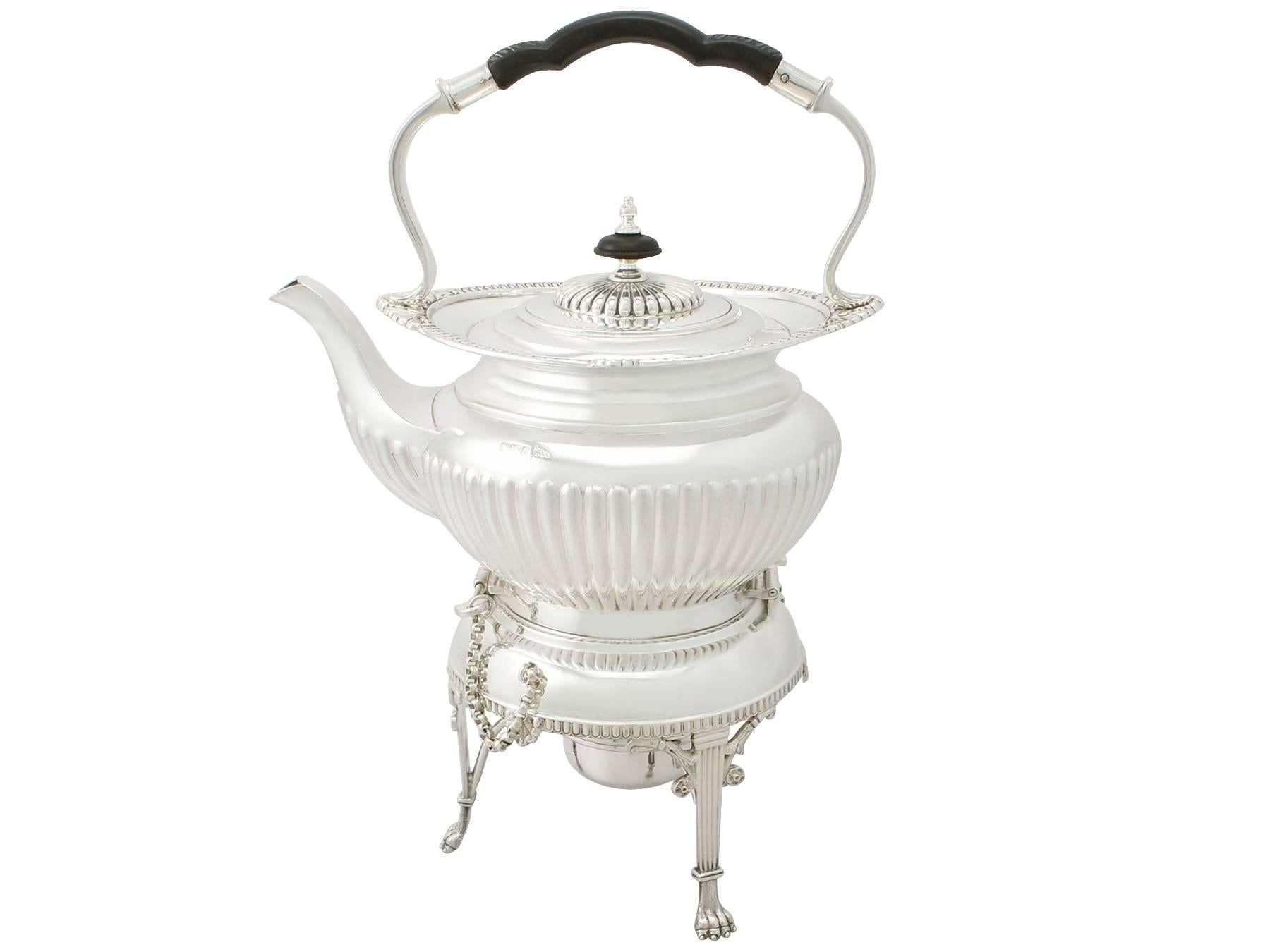 A fine and impressive antique Edwardian English sterling silver four piece tea service in the Queen Anne style; an addition to our silver teaware collection.

This fine antique Edwardian sterling silver four piece tea service / set consists of a