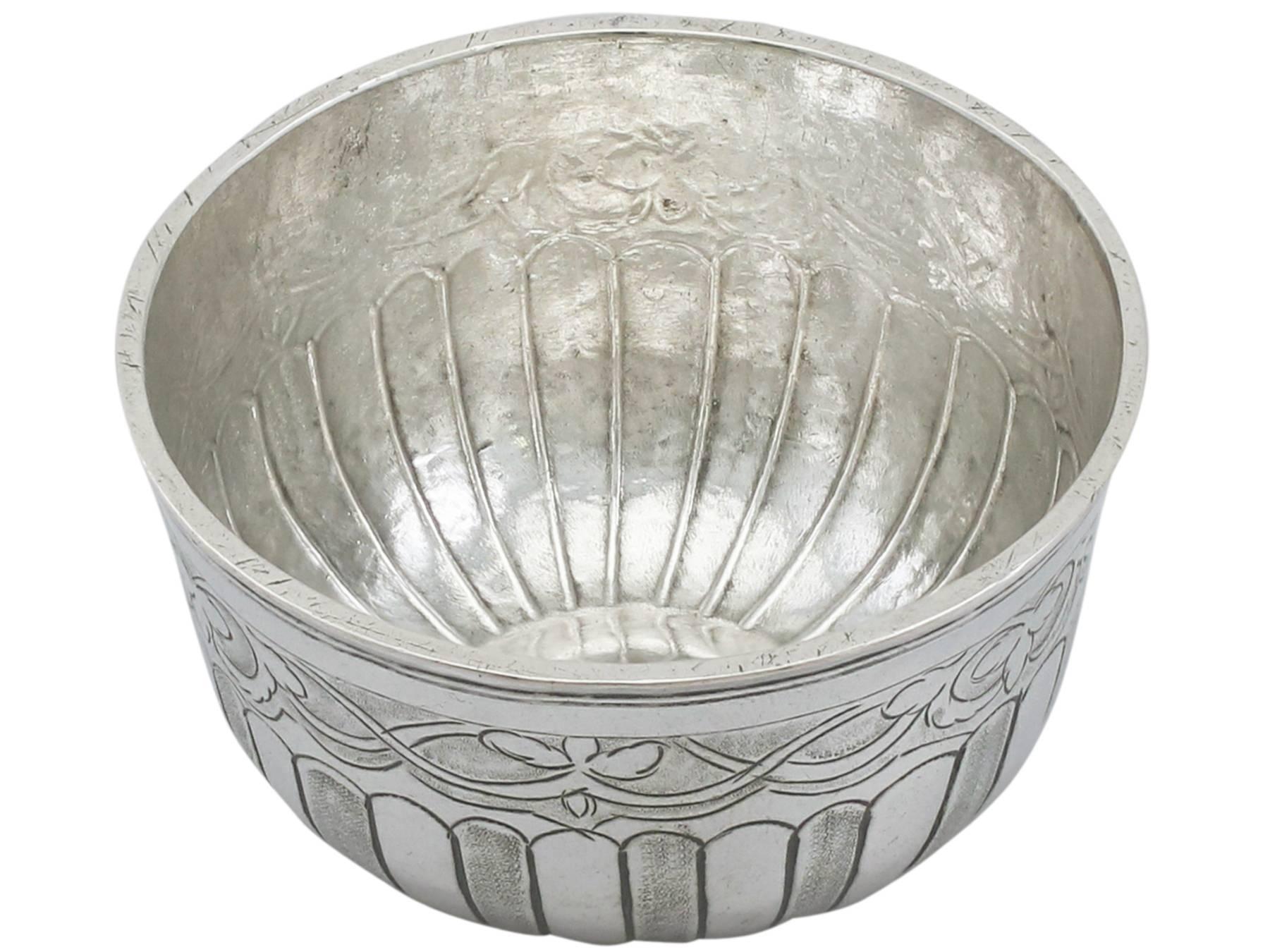 A fine and impressive antique Russian silver drinking bowl; an addition to our range of wine and drinks related silverware collection

This fine antique Russian silver drinking bowl has a circular rounded form.

The upper portion of this