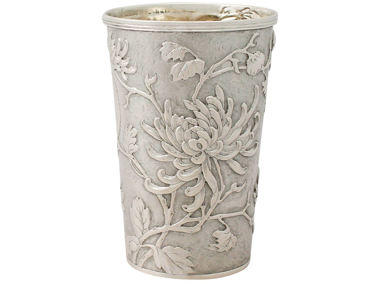 A fine and impressive antique Chinese export silver beaker; an addition to our range of Asian silverware

This fine antique Chinese export silver beaker has a cylindrical tapering form.

The body is embellished with fine and impressive embossed
