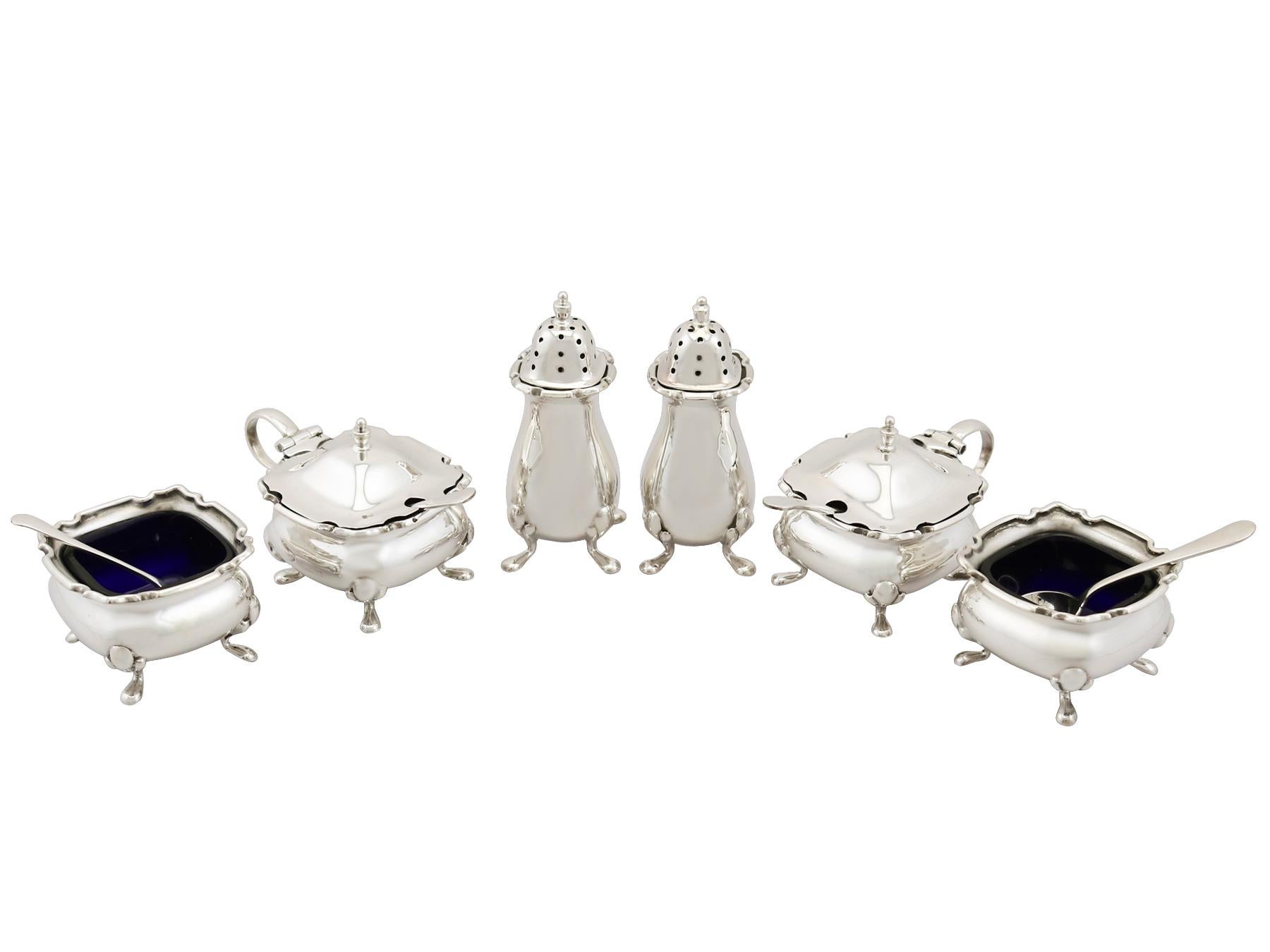 An exceptional, fine and impressive antique George V English sterling silver six piece condiment/cruet set - boxed; an addition to our dining silverware collection.

This exceptional antique George V six-piece sterling silver condiment set
