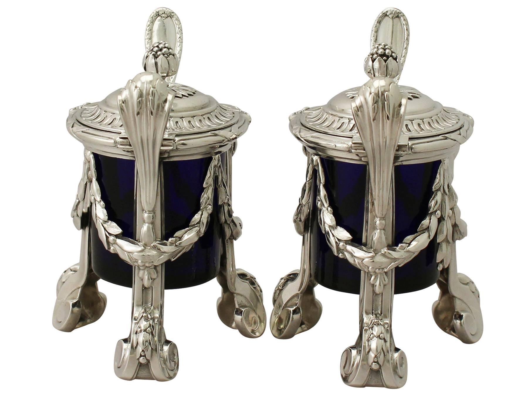 An exceptional, fine and impressive, unusual pair of antique George V English sterling silver mustard pots made in the Regency style; an addition to our silver cruet and condiments collection

These exceptional antique George V sterling silver