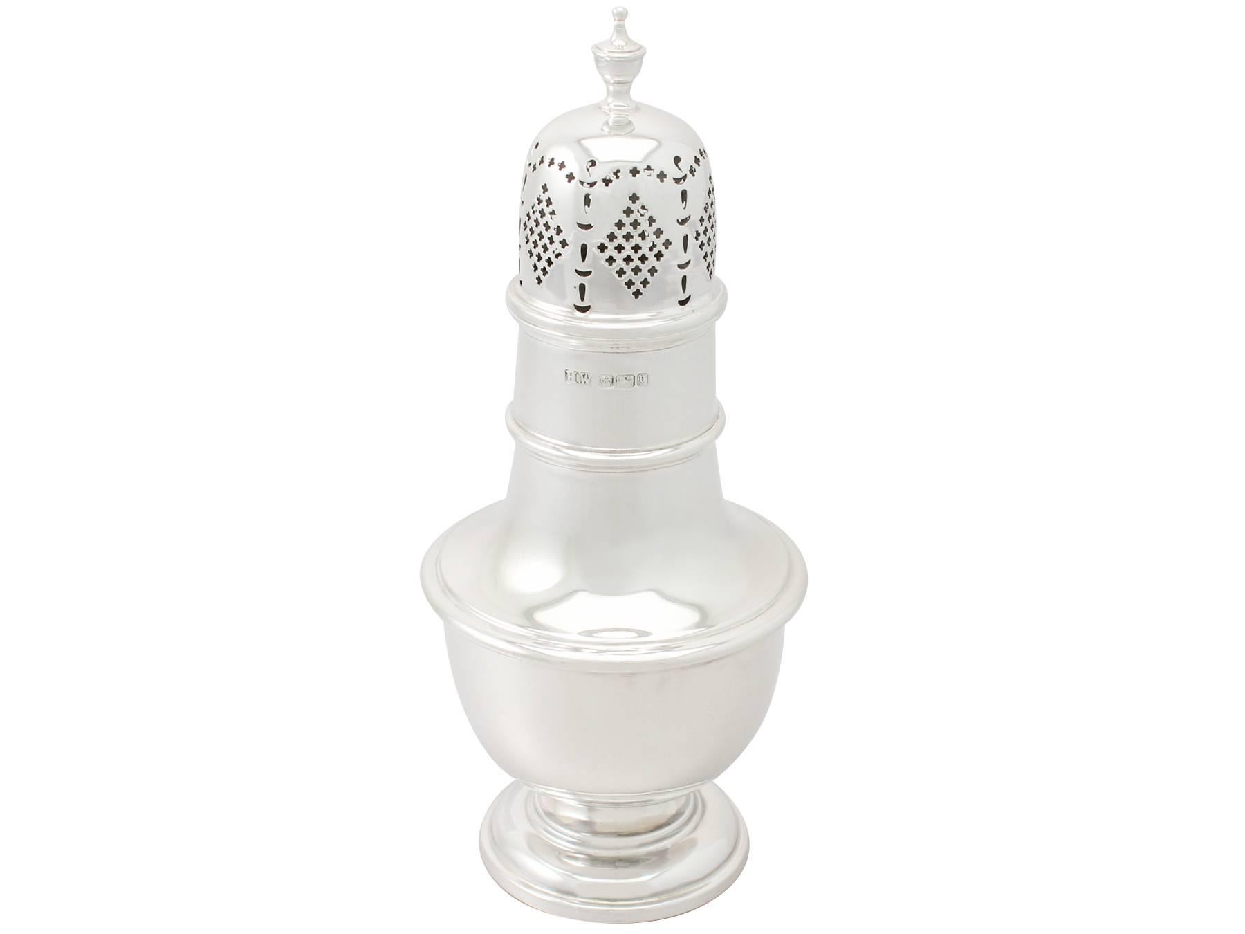 A fine and impressive antique Victorian sterling silver baluster shaped sugar caster, made by Lee & Wigfull ; part of our antique silver teaware collection.

This impressive antique Victorian sterling silver sugar caster has a plain baluster shaped