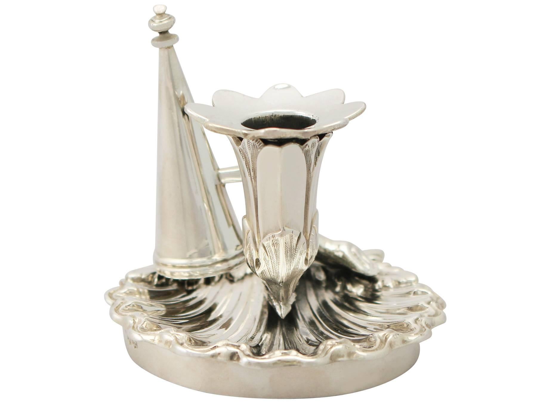 A fine antique William IV English sterling silver taper chamber candlestick; an addition to our silver candlestick/candelabra collection.

This fine antique William IV sterling silver taper chamber candlestick (chamberstick) has a naturalistic
